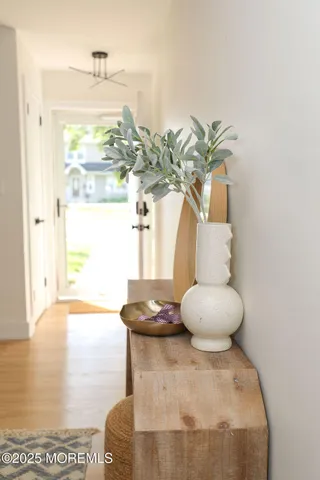 a bedroom with bed and a chair