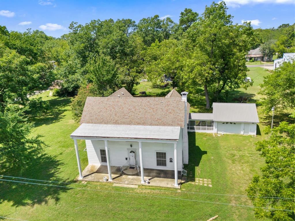 260 South Main Street Detroit, TX 75436 - Photo 13 of 20 a aerial view of a house with swimming pool garden and patio
