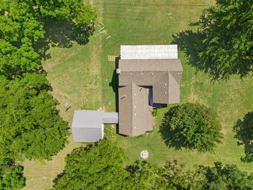 260 South Main Street Detroit, TX 75436 - Photo 20 of 20 an aerial view of a house with a yard