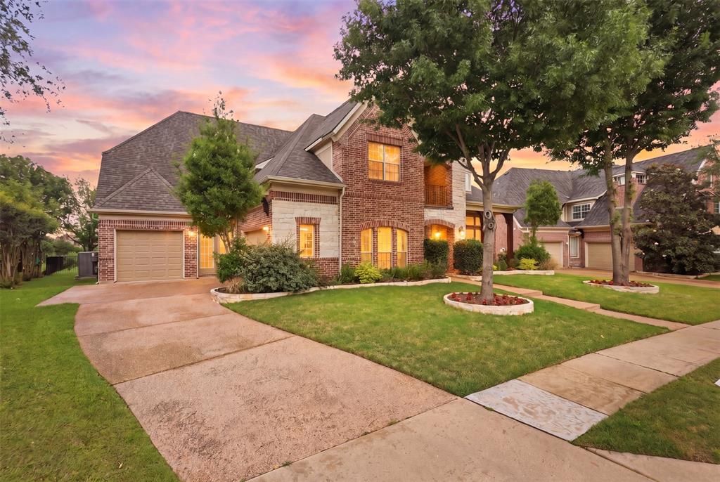 2841 Meadow Ridge Drive Prosper, TX 75078 - Photo 2 of 40 a front view of a house with yard