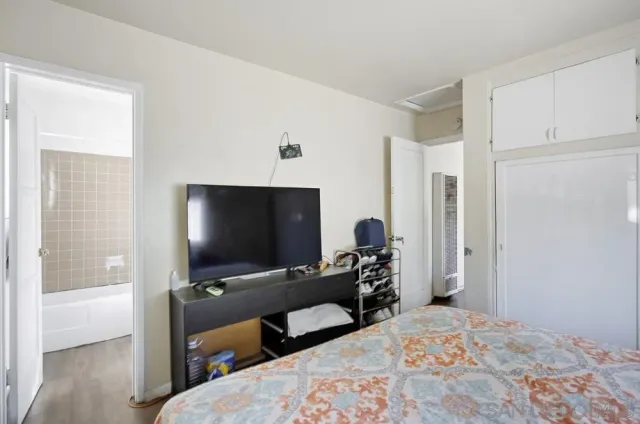 a bathroom with a bathtub and sink