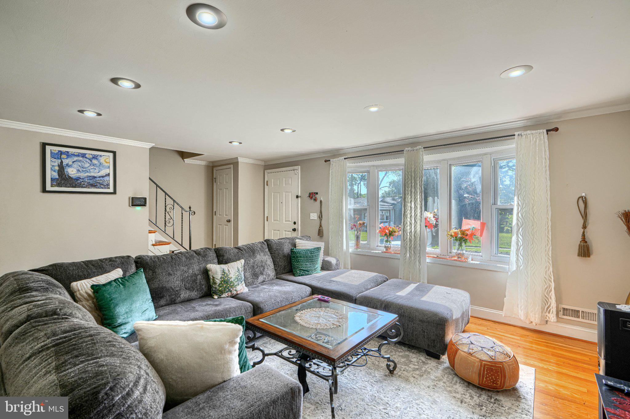 3708 Cassen Road Randallstown, MD 21133 - Photo 6 of 38 a living room with furniture and a large window