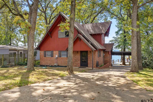 a house with trees in front of it
