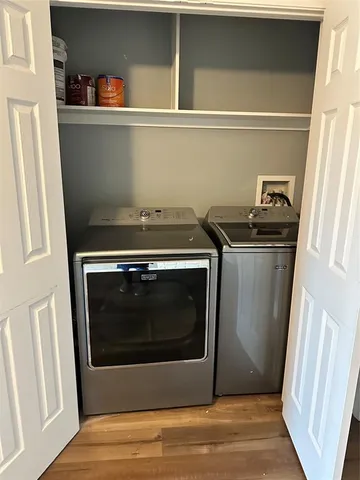 a stove top oven sitting inside of a kitchen