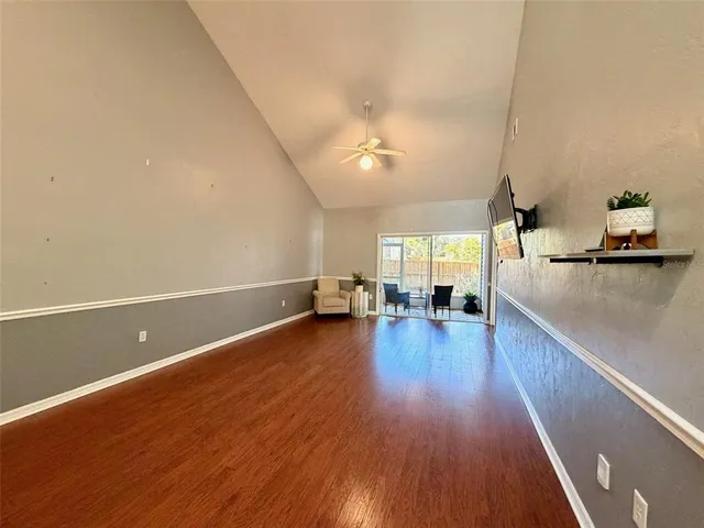 a view of a living room and hardwood floor