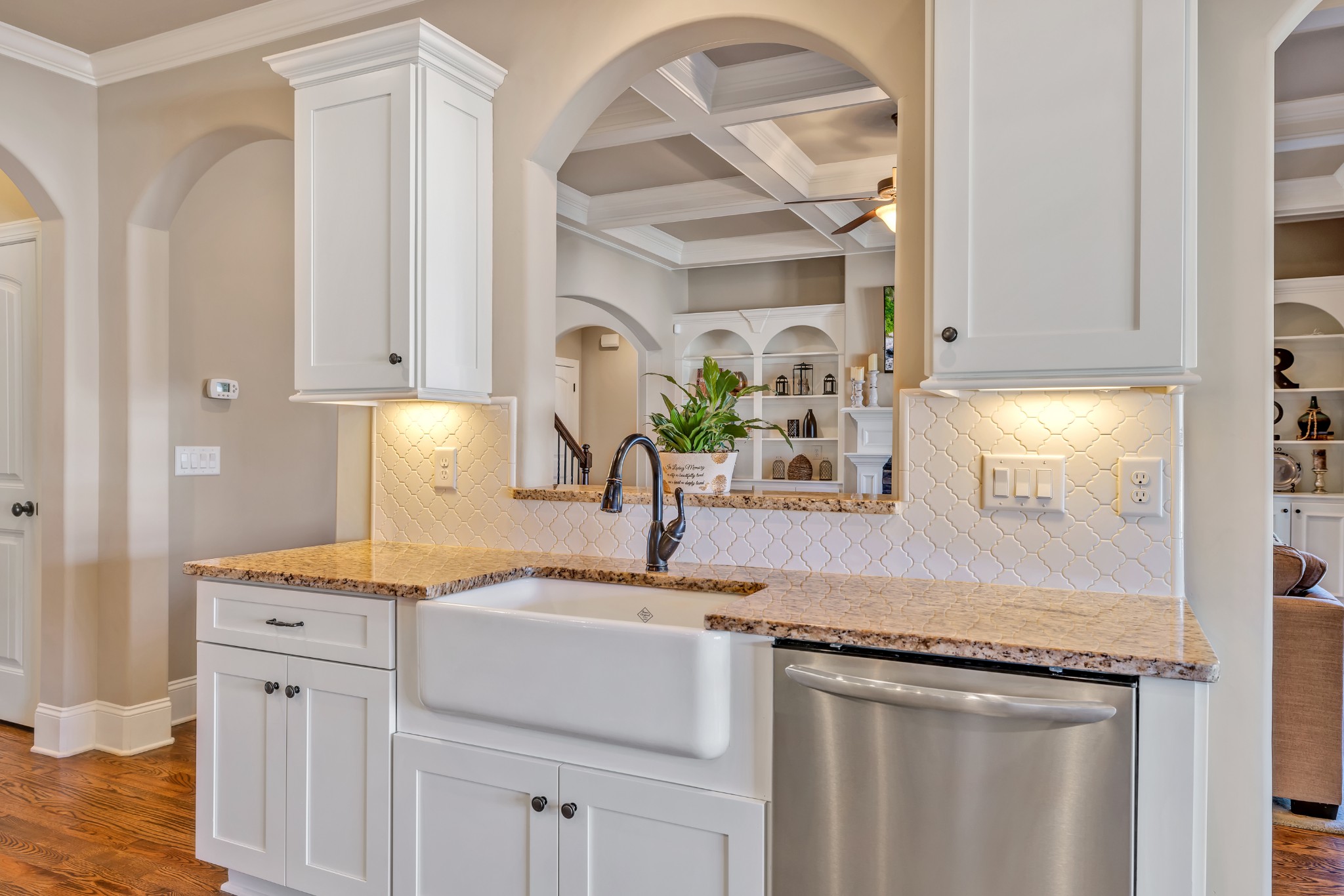 4008 Canberra Drive Spring Hill, TN 37174 - Photo 28 of 63 a kitchen with granite countertop a sink stainless steel appliances and cabinets