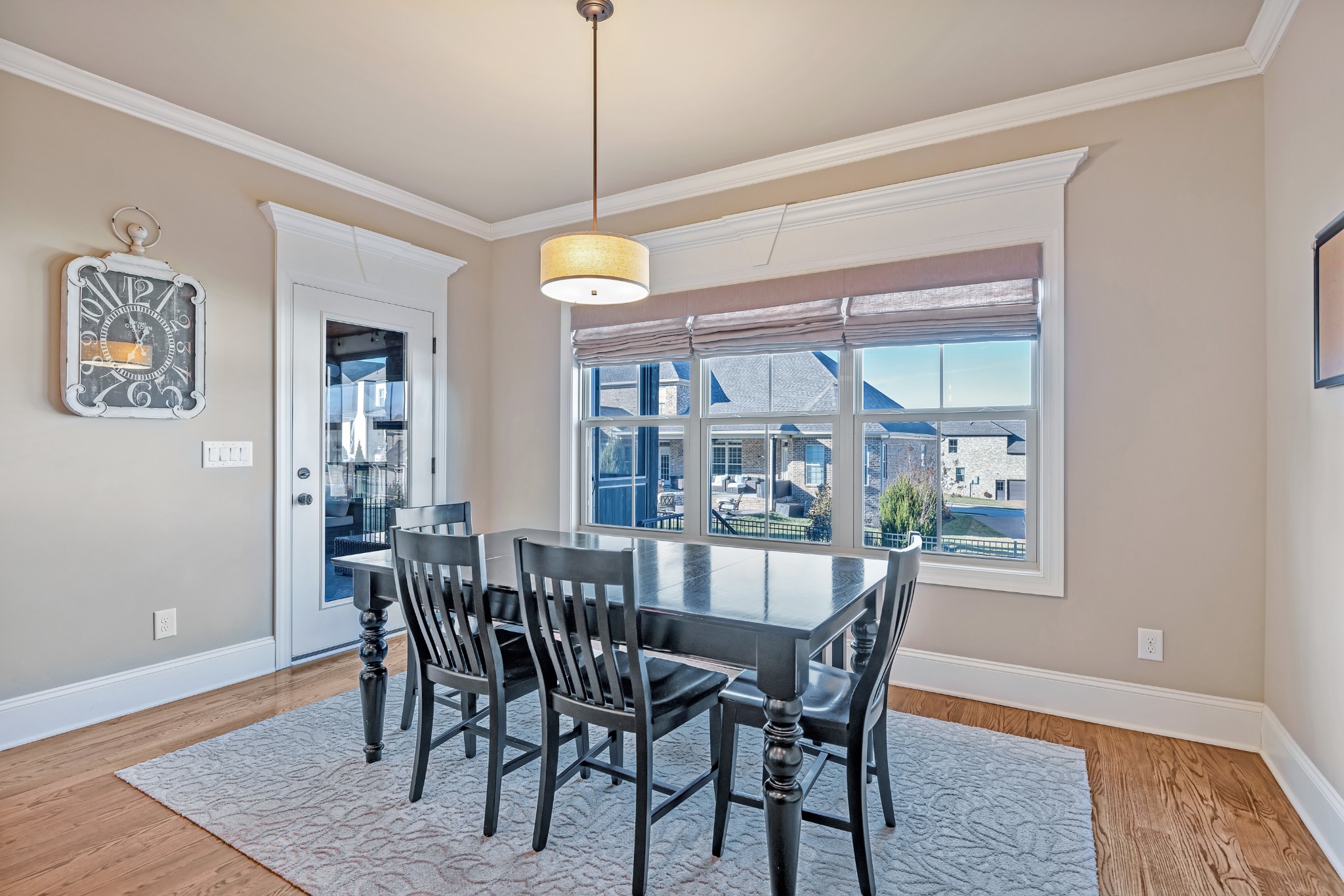 4008 Canberra Drive Spring Hill, TN 37174 - Photo 34 of 63 a view of a dining room with furniture window and wooden floor