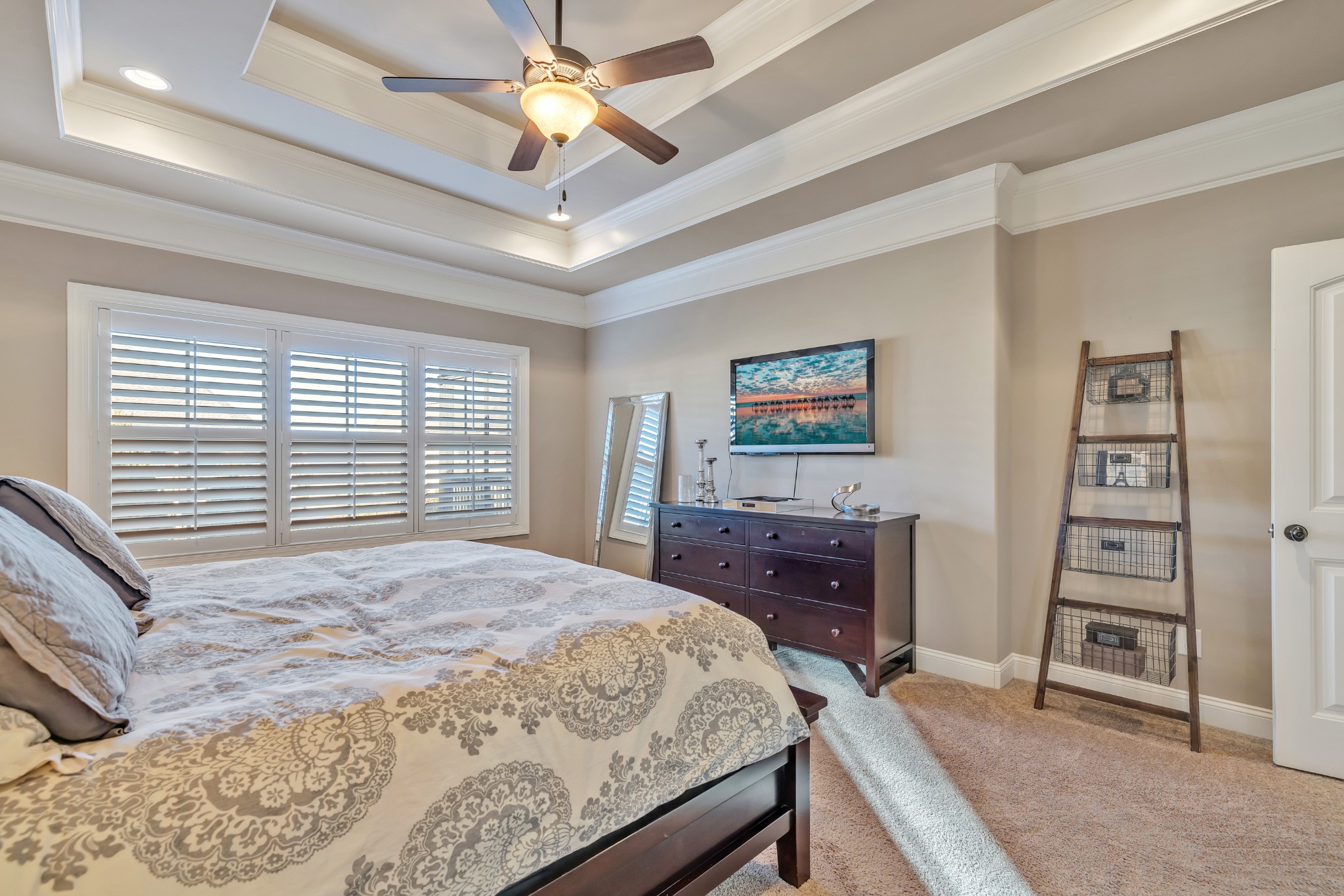 4008 Canberra Drive Spring Hill, TN 37174 - Photo 38 of 63 a bedroom with a bed a dresser and a book shelf
