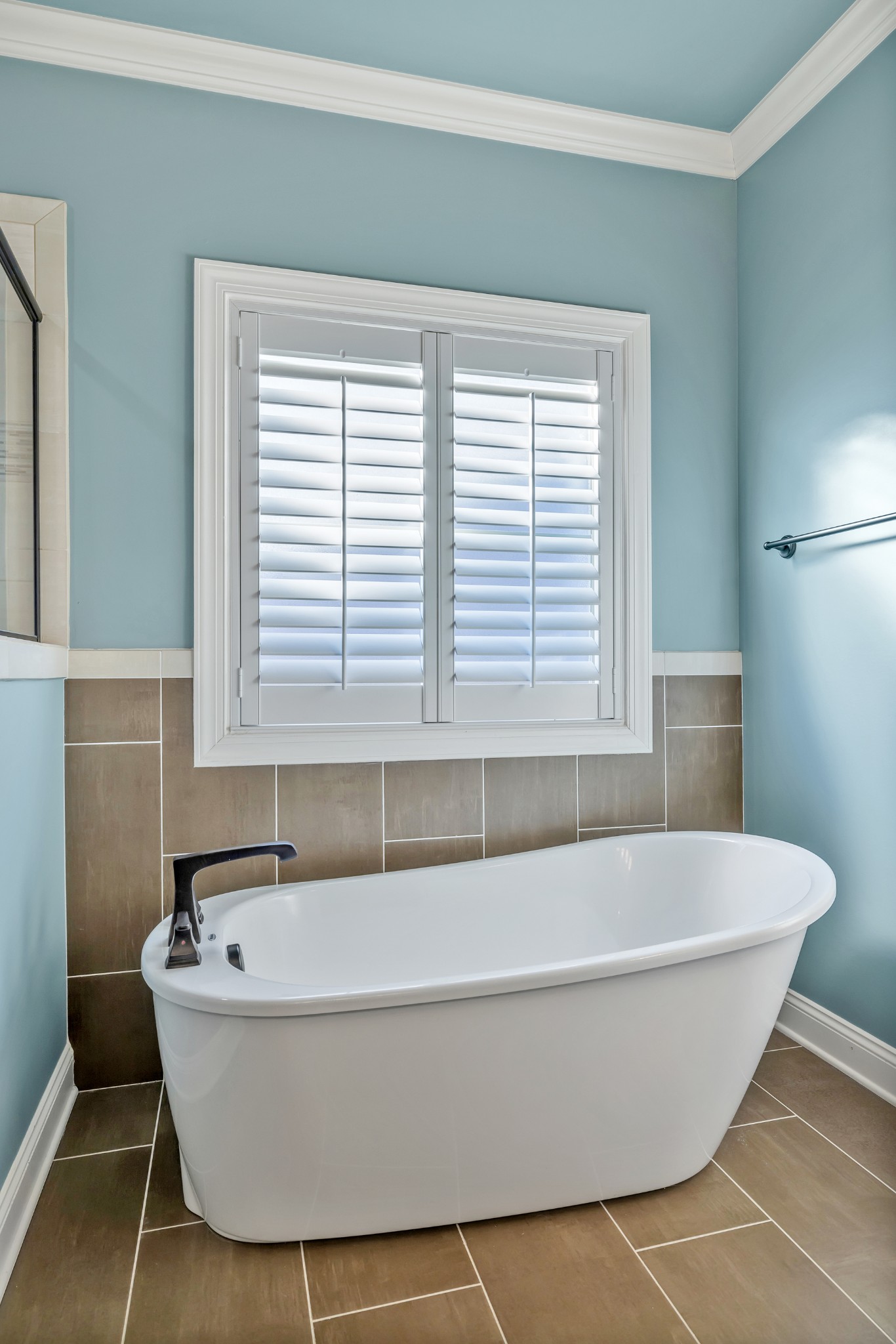 4008 Canberra Drive Spring Hill, TN 37174 - Photo 46 of 63 a white bath tub sitting in a bathroom