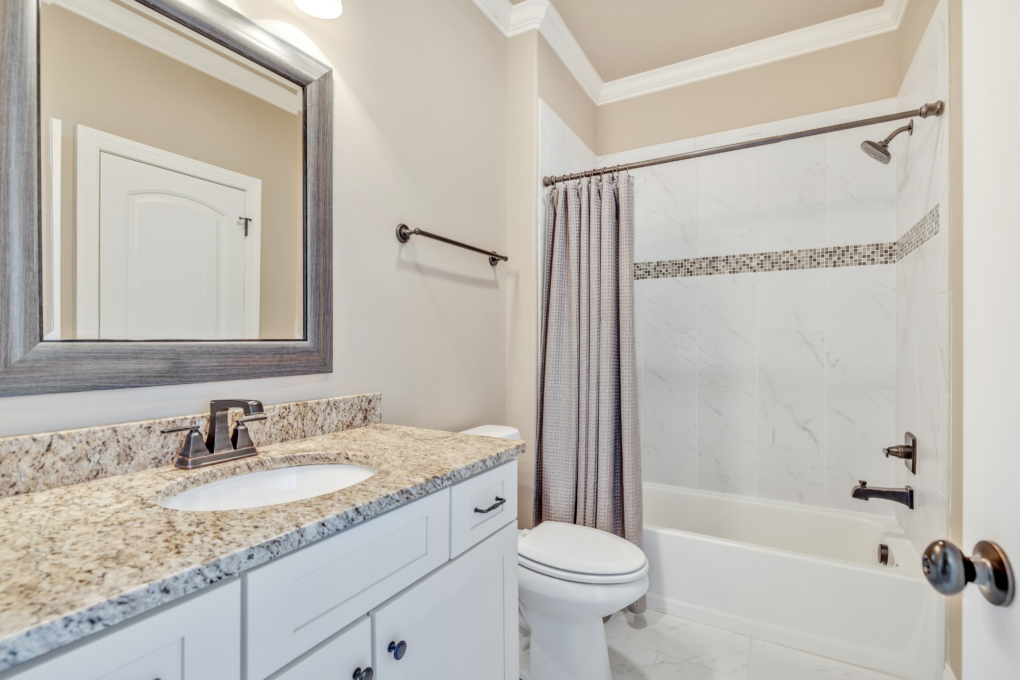 4008 Canberra Drive Spring Hill, TN 37174 - Photo 49 of 63 a bathroom with a granite countertop sink mirror vanity and toilet