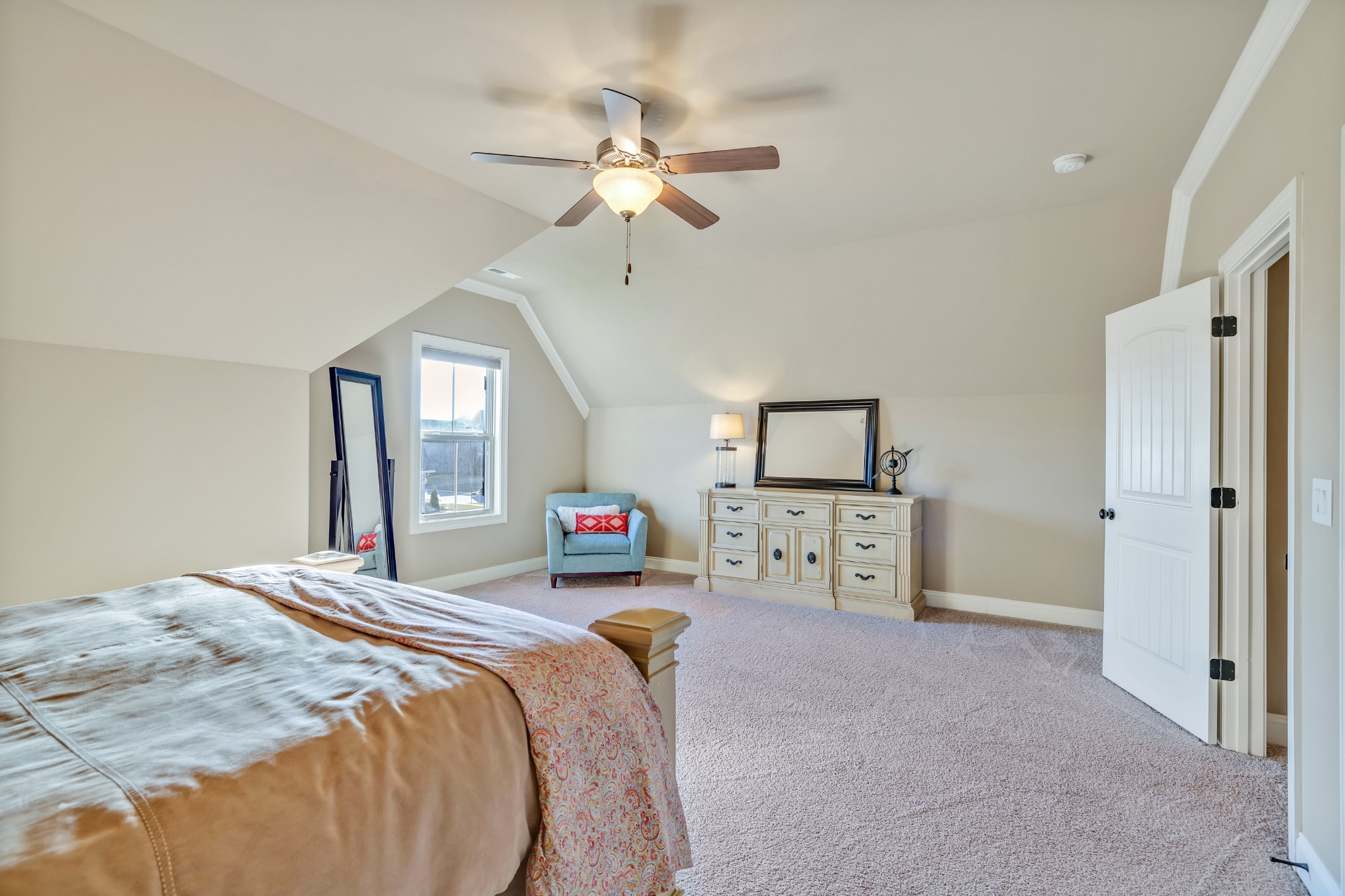 4008 Canberra Drive Spring Hill, TN 37174 - Photo 50 of 63 a bedroom with a bed and a chandelier