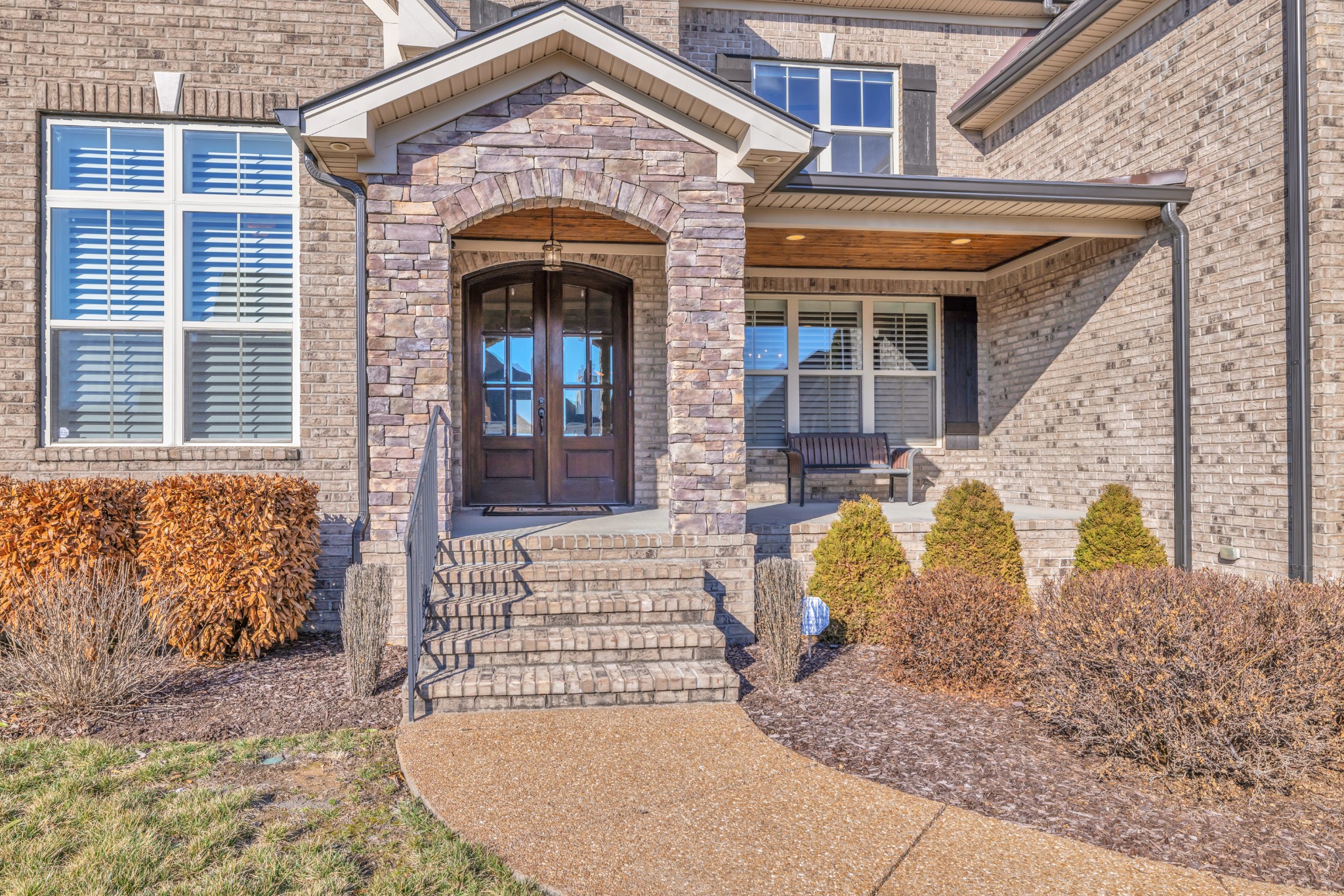 4008 Canberra Drive Spring Hill, TN 37174 - Photo 5 of 63 a front view of a house with large windows