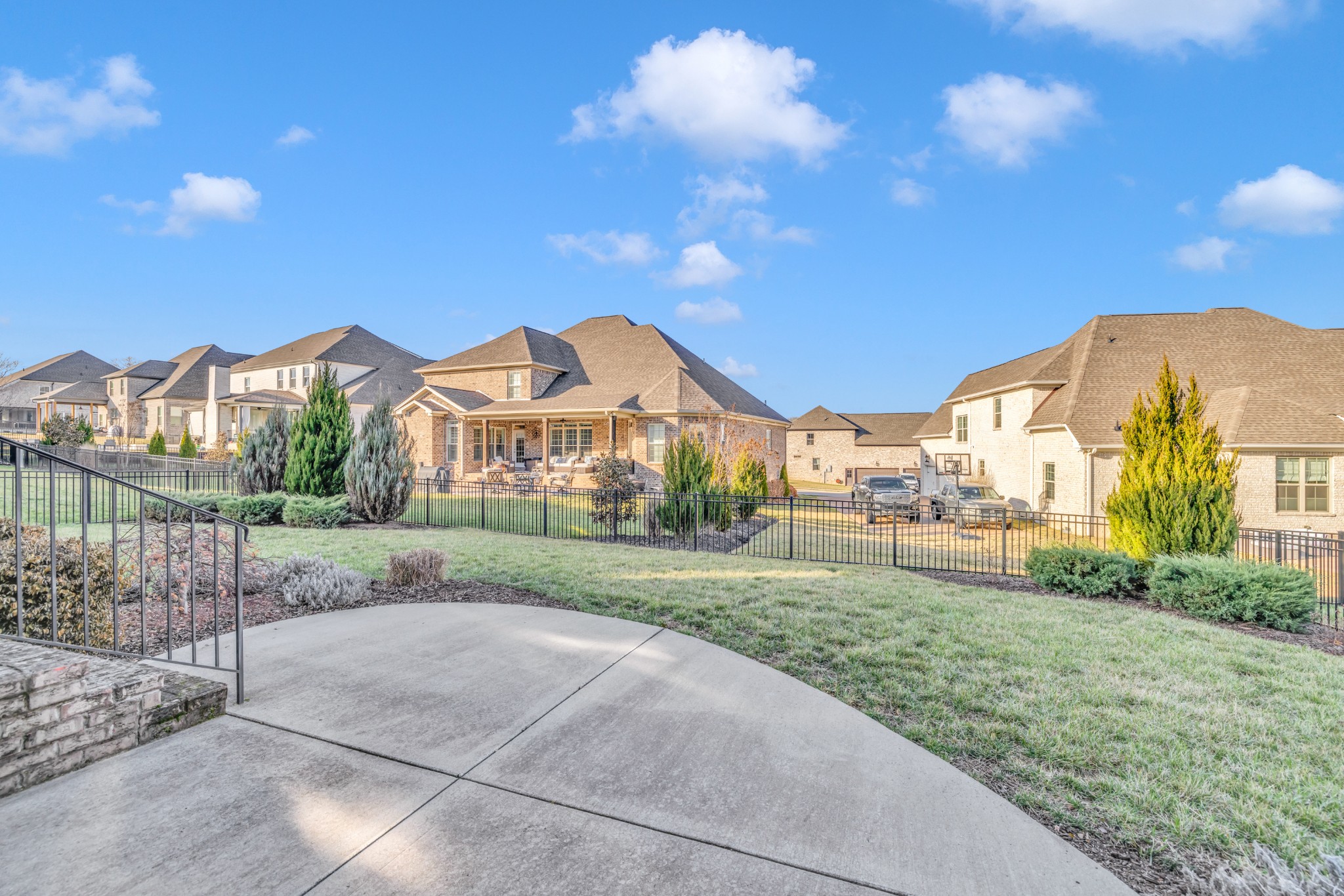 4008 Canberra Drive Spring Hill, TN 37174 - Photo 60 of 63 a view of a street with a houses in the background