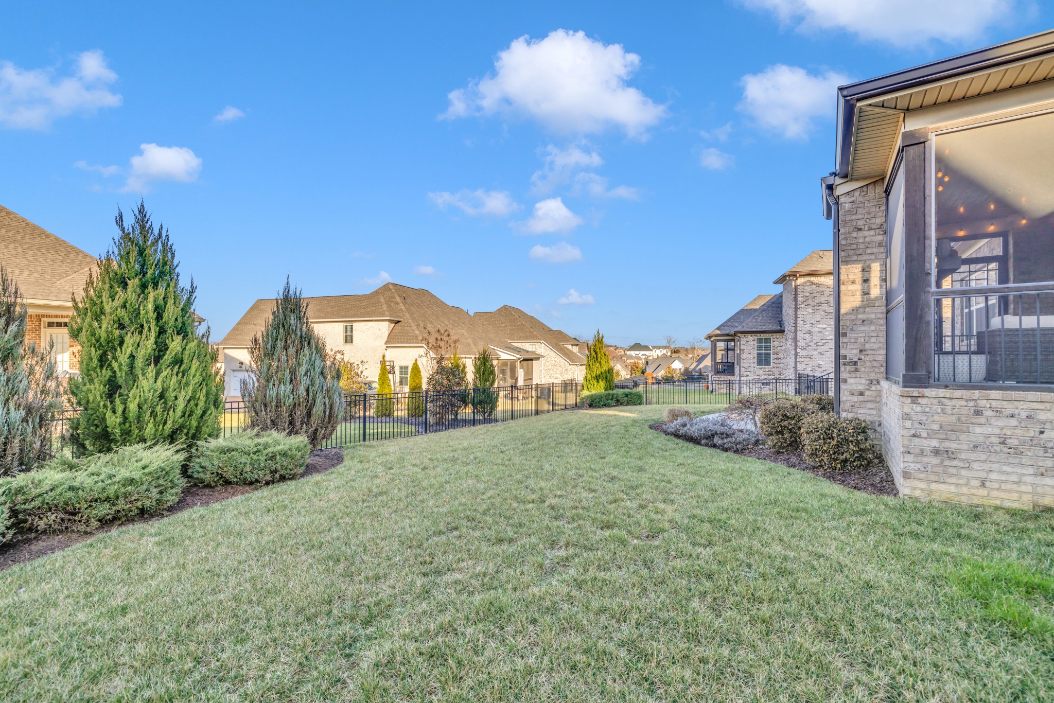 4008 Canberra Drive Spring Hill, TN 37174 - Photo 62 of 63 a view of a green field in front of a house