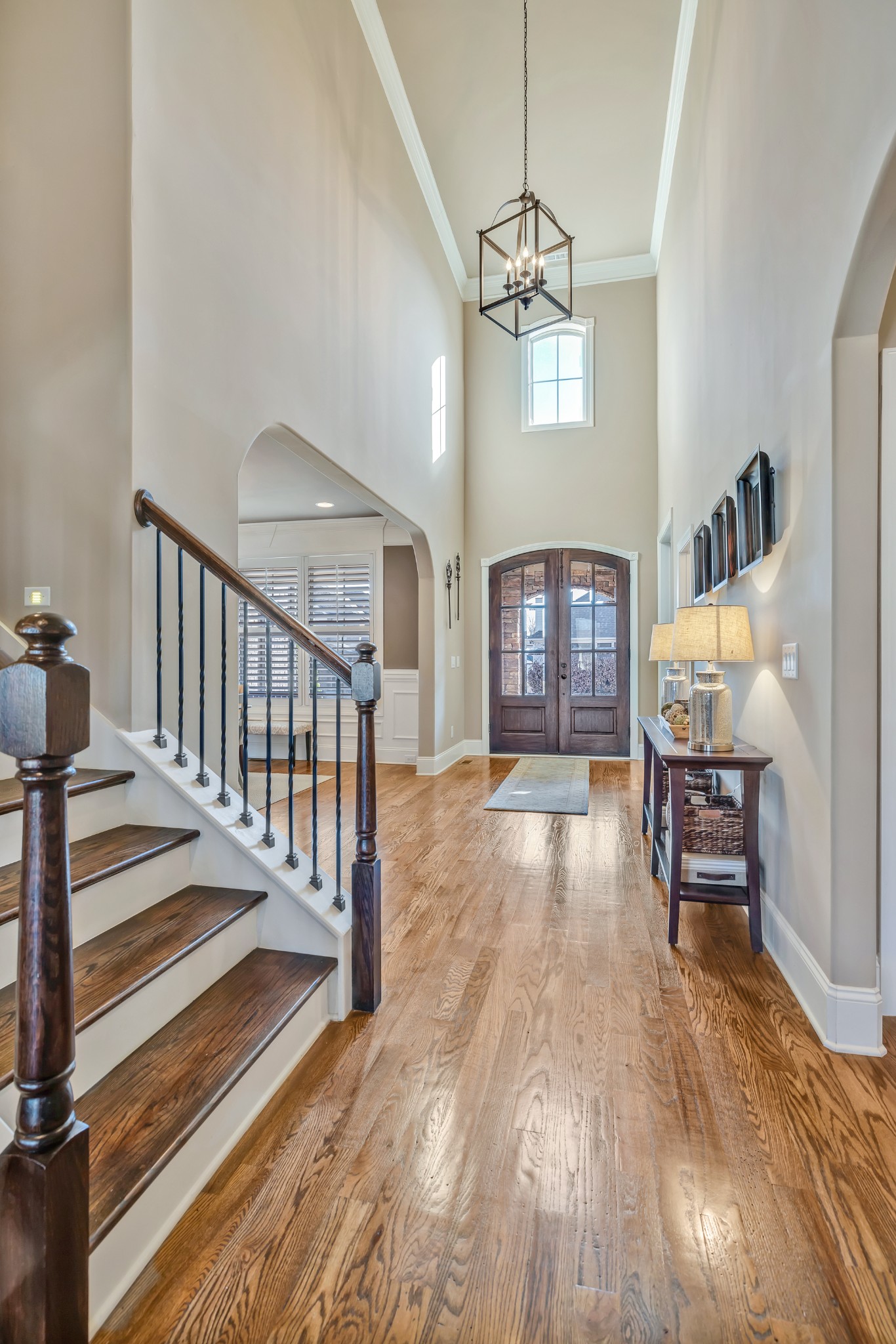 4008 Canberra Drive Spring Hill, TN 37174 - Photo 8 of 63 a view of a livingroom with furniture wooden floor chandelier and windows