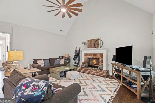 a kitchen with a stove a sink and a refrigerator