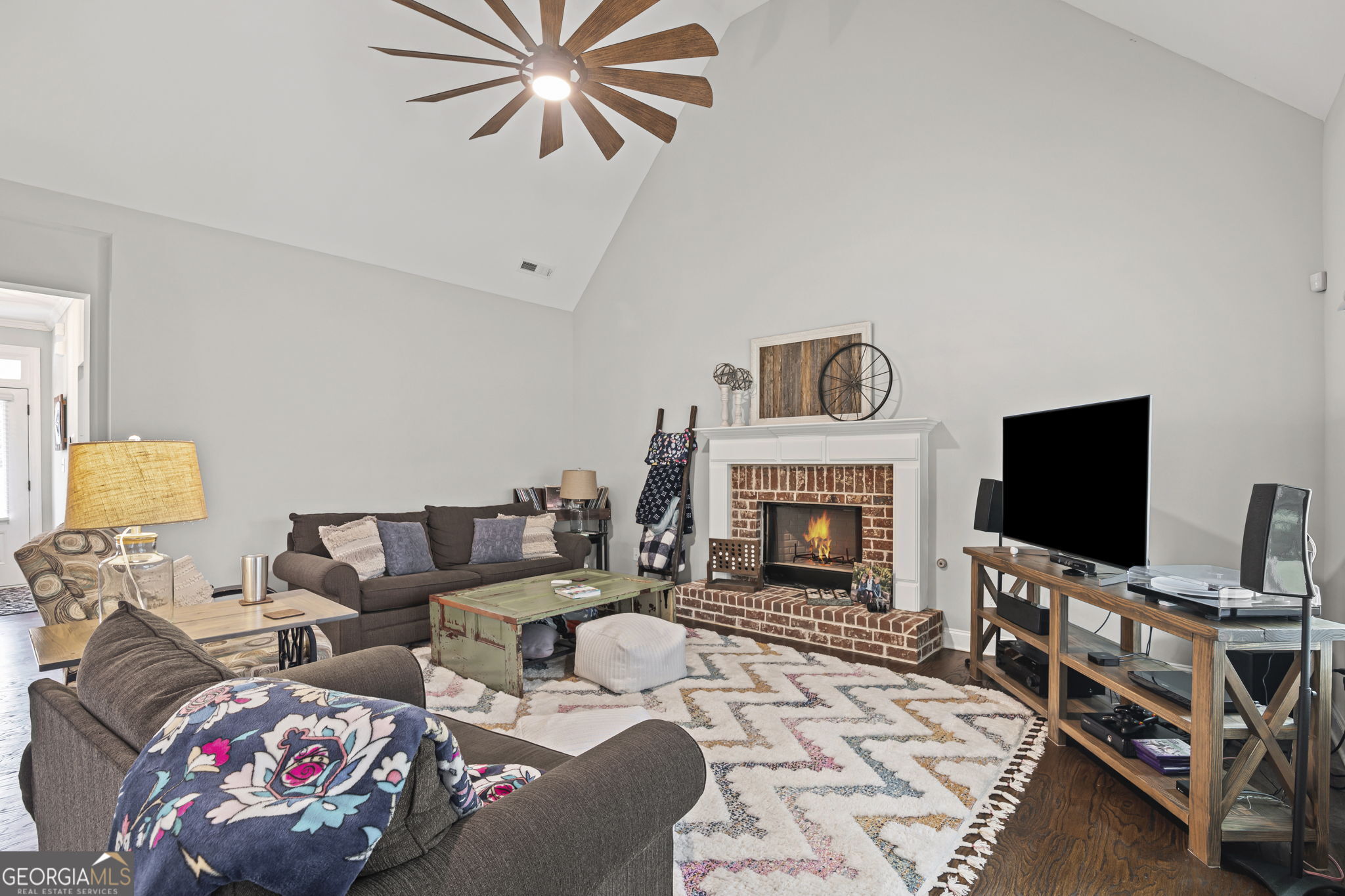 150 Duck Drive Senoia, GA 30276 - Photo 15 of 73 a living room with furniture and a flat screen tv