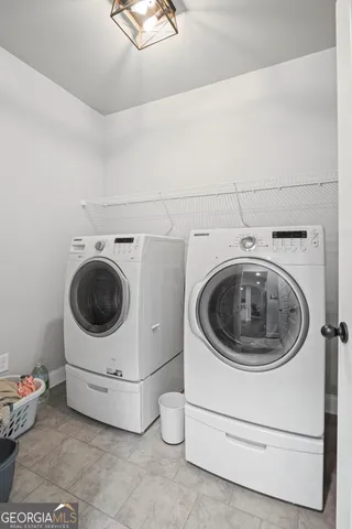 a white bath tub sitting next to a white sink