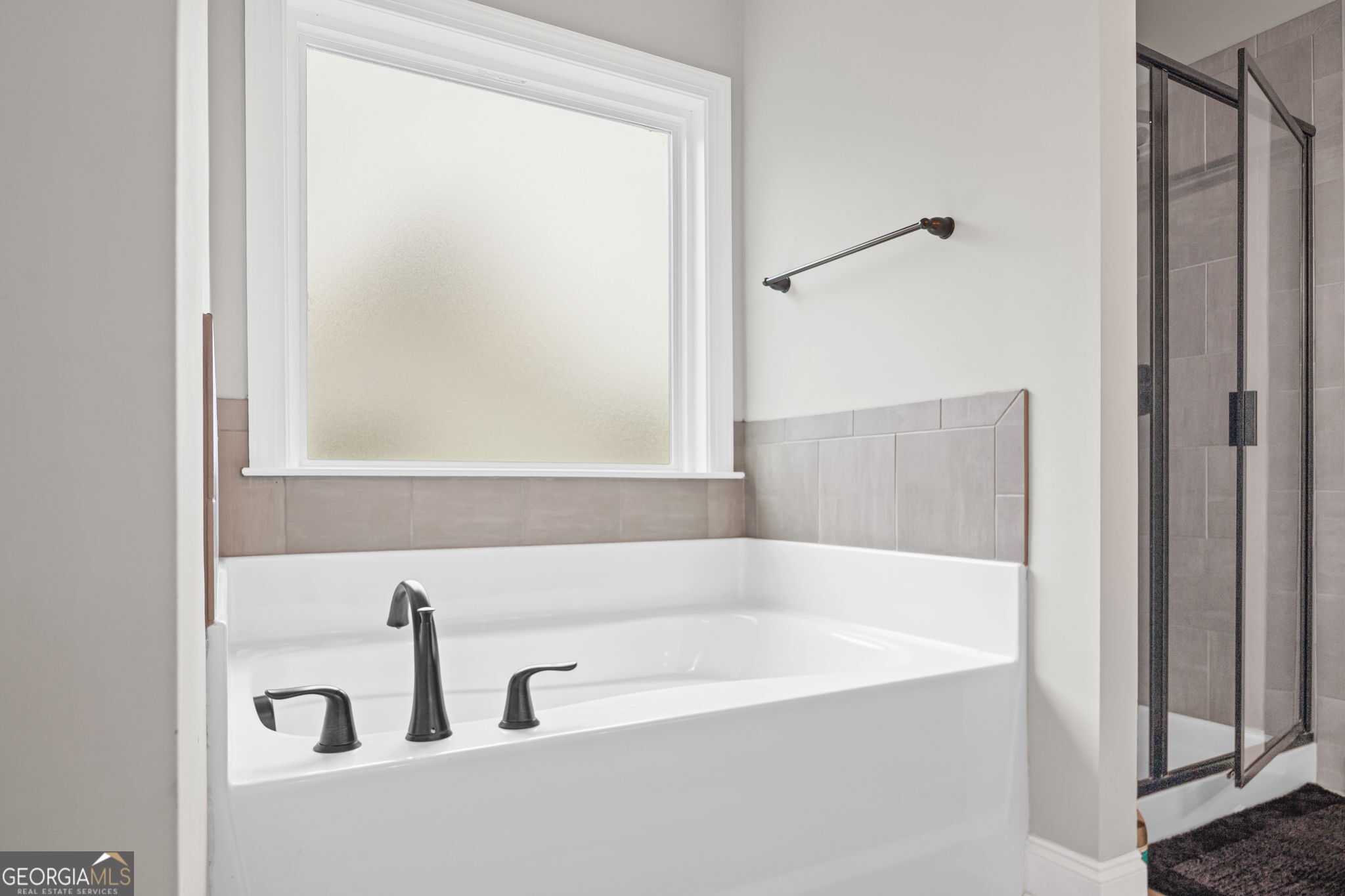 150 Duck Drive Senoia, GA 30276 - Photo 32 of 73 a white bath tub sitting next to a white sink