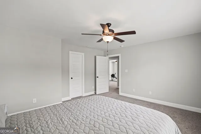 an aerial view of a house with outdoor space pool seating area and yard