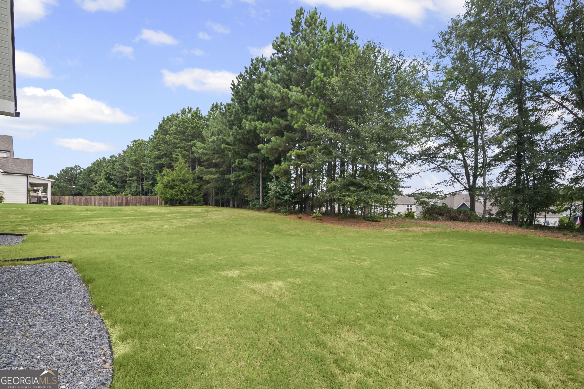150 Duck Drive Senoia, GA 30276 - Photo 44 of 73 a view of a field of grass and trees