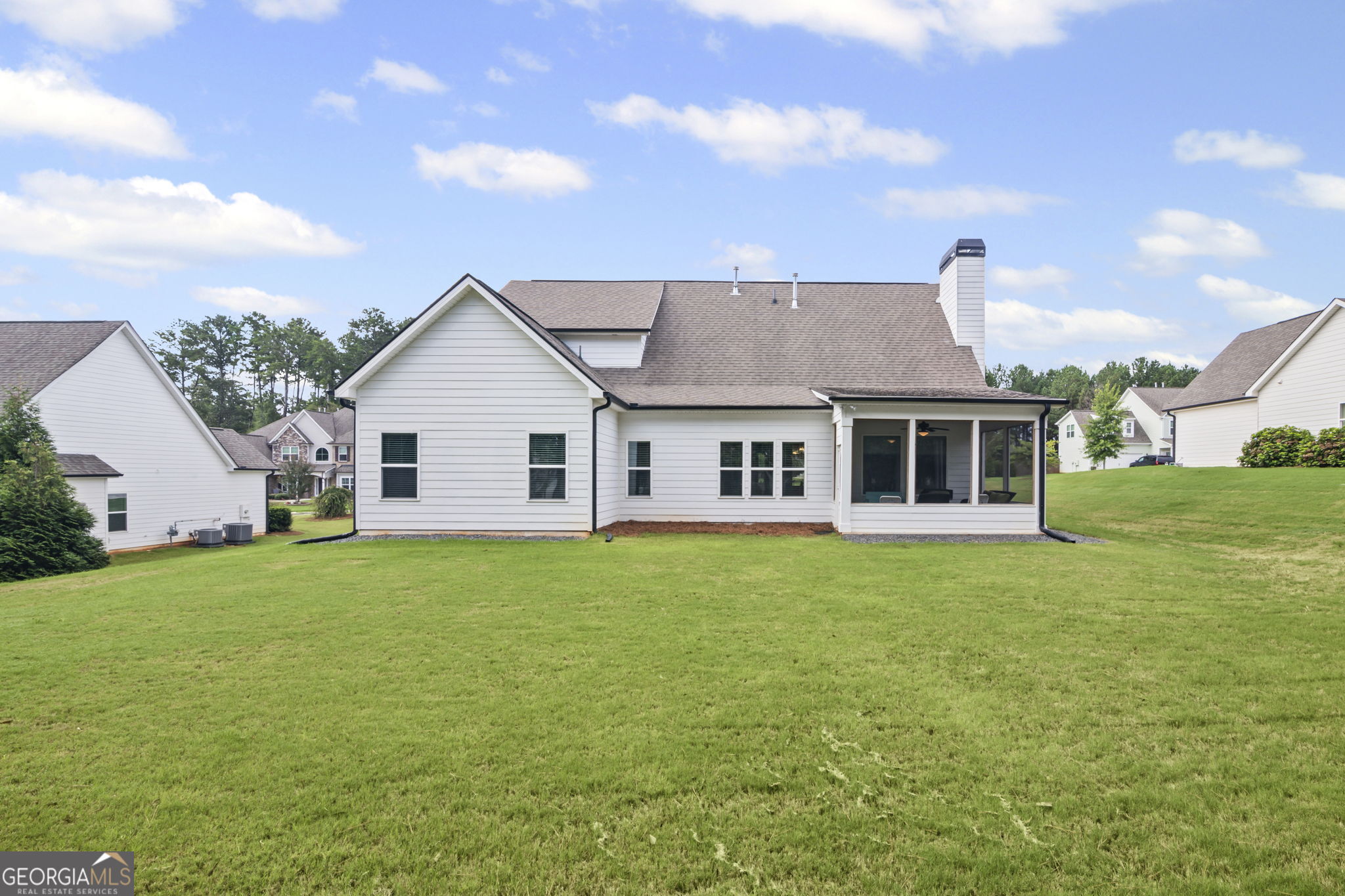 150 Duck Drive Senoia, GA 30276 - Photo 45 of 73 a view of a yard in front of a house with a large tree