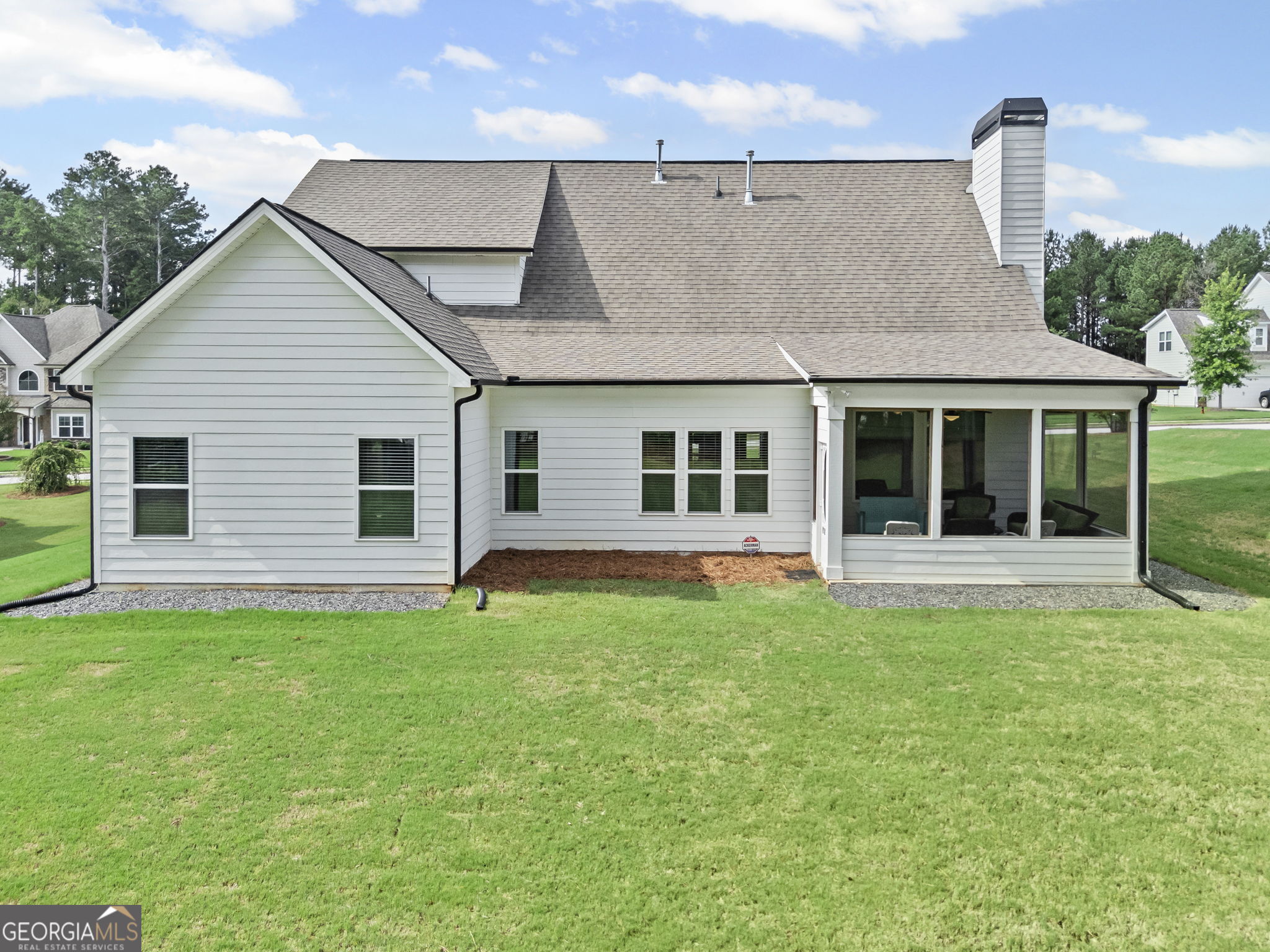 150 Duck Drive Senoia, GA 30276 - Photo 49 of 73 a front view of a house with a garden