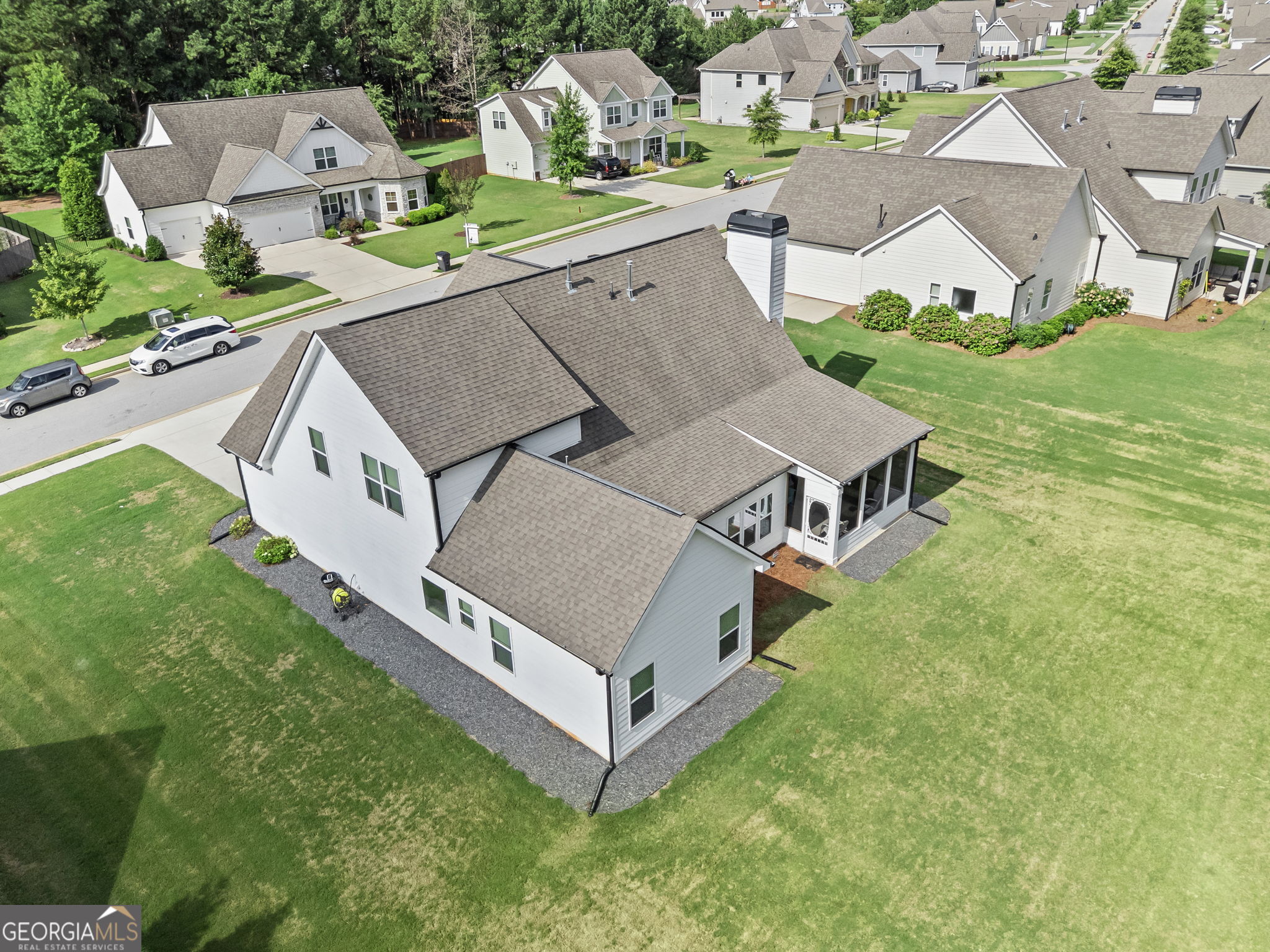 150 Duck Drive Senoia, GA 30276 - Photo 52 of 73 an aerial view of a house with a garden and houses