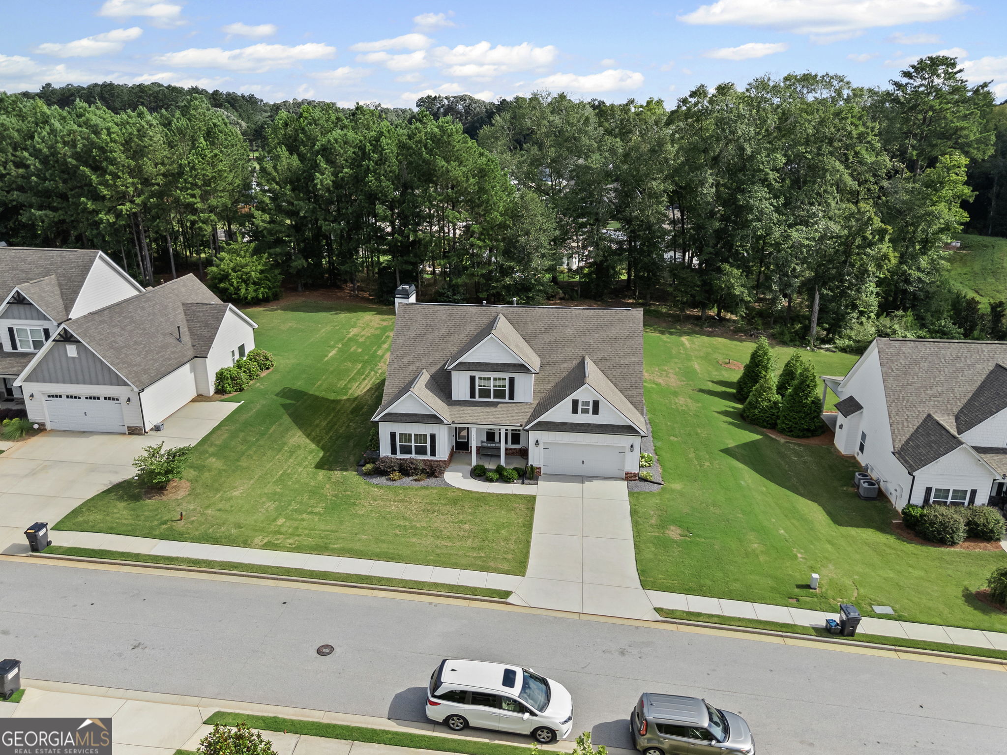 150 Duck Drive Senoia, GA 30276 - Photo 71 of 73 an aerial view of a house with a garden and a yard