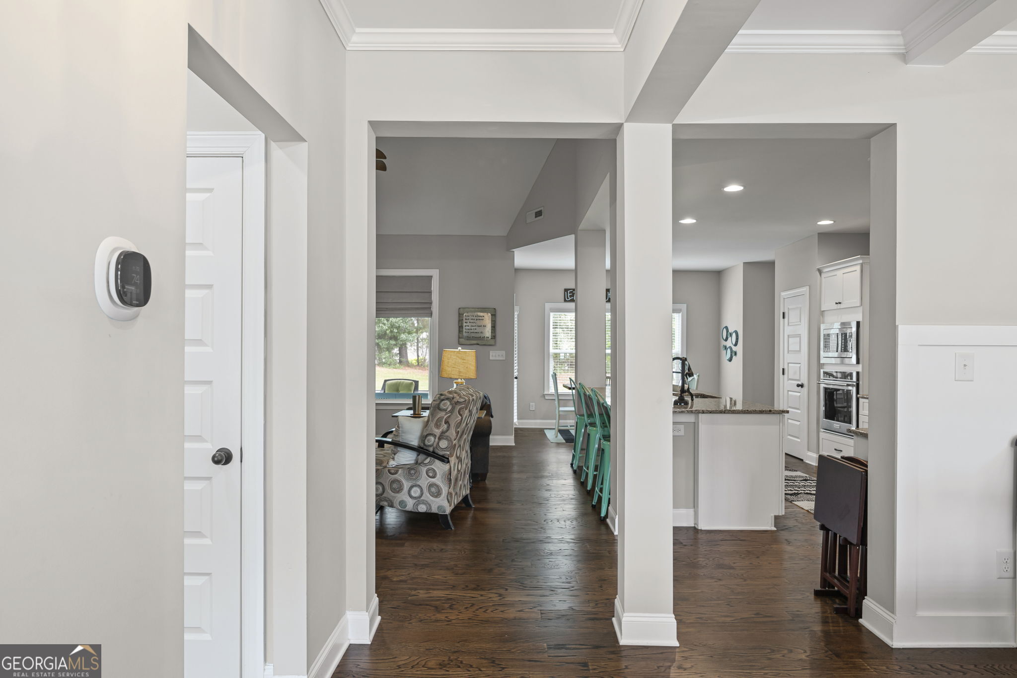 150 Duck Drive Senoia, GA 30276 - Photo 10 of 73 a view of a hallway with wooden floor windows and livingroom