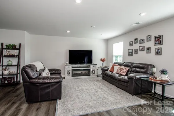 a kitchen with a table and chairs in it