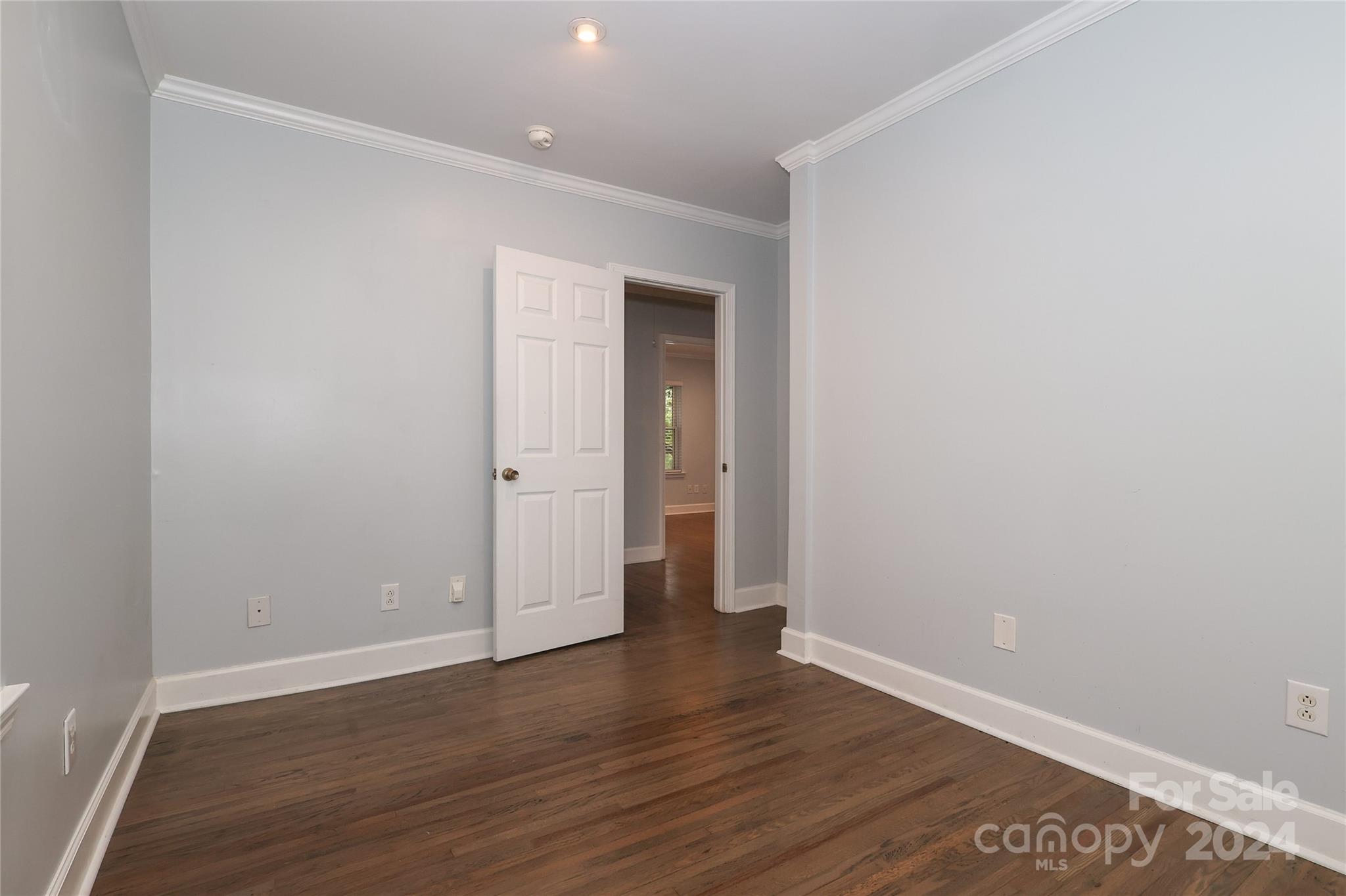 2012 Scott Avenue Charlotte, NC 28203 - Photo 33 of 43 a view of an empty room with wooden floor