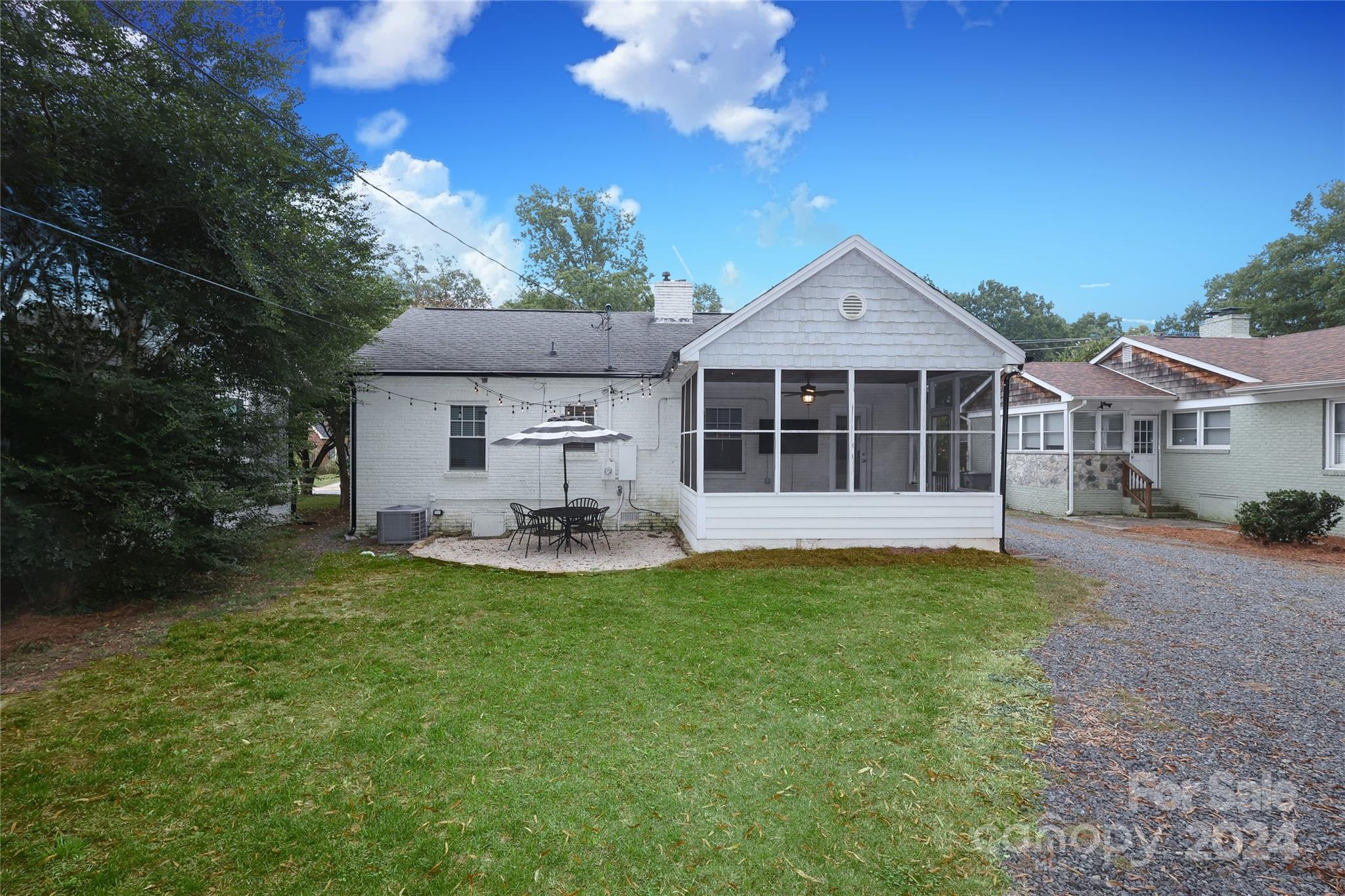 2012 Scott Avenue Charlotte, NC 28203 - Photo 41 of 43 a front view of a house with a yard and garage
