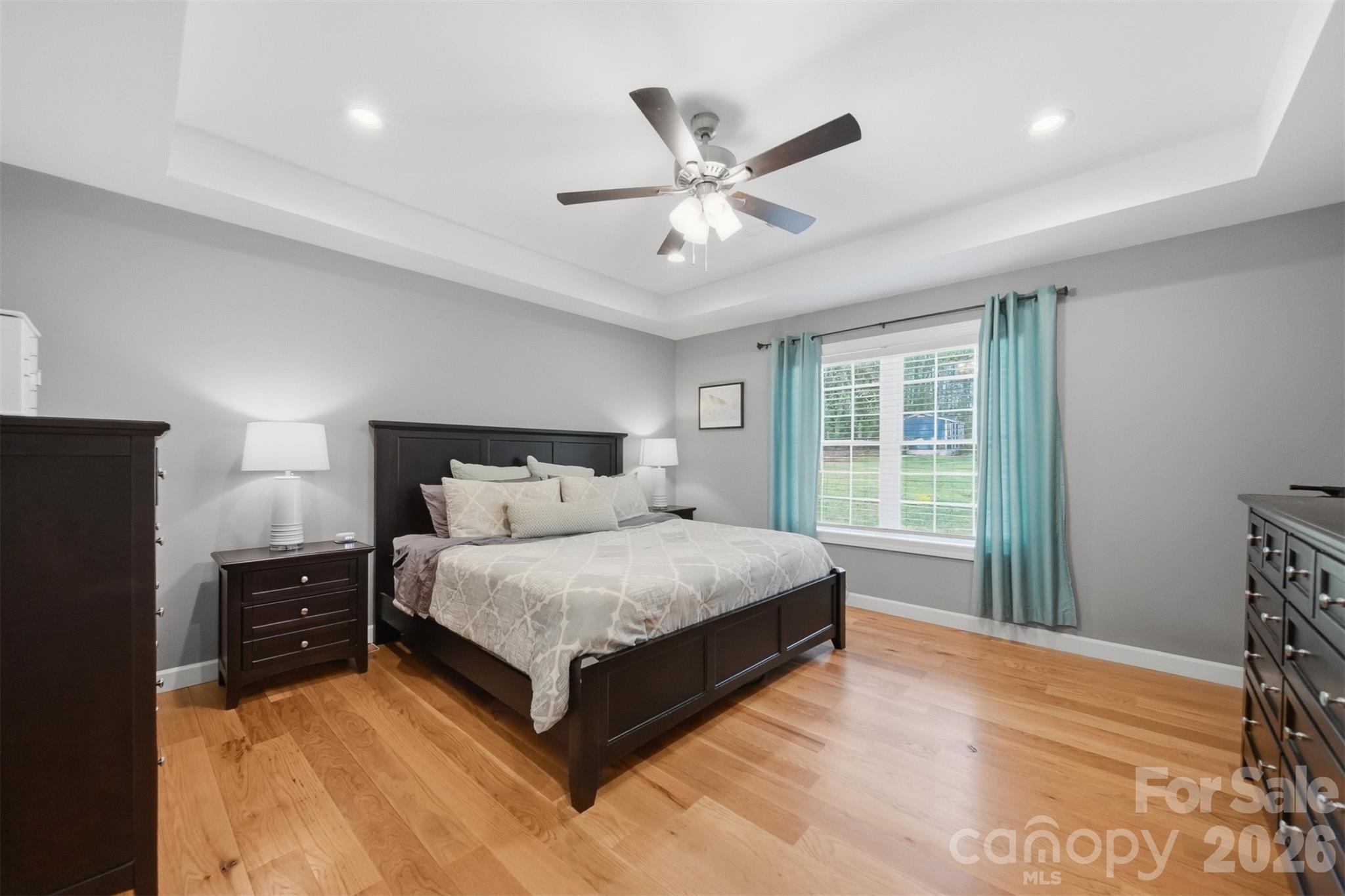 490 Dudley Shoals Road Granite Falls, NC 28630 - Photo 14 of 38 a large bedroom with a bed and window