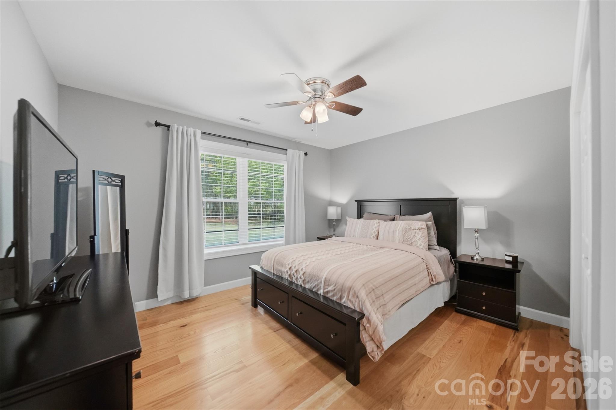 490 Dudley Shoals Road Granite Falls, NC 28630 - Photo 18 of 38 a large bed sitting in a bedroom next to a window
