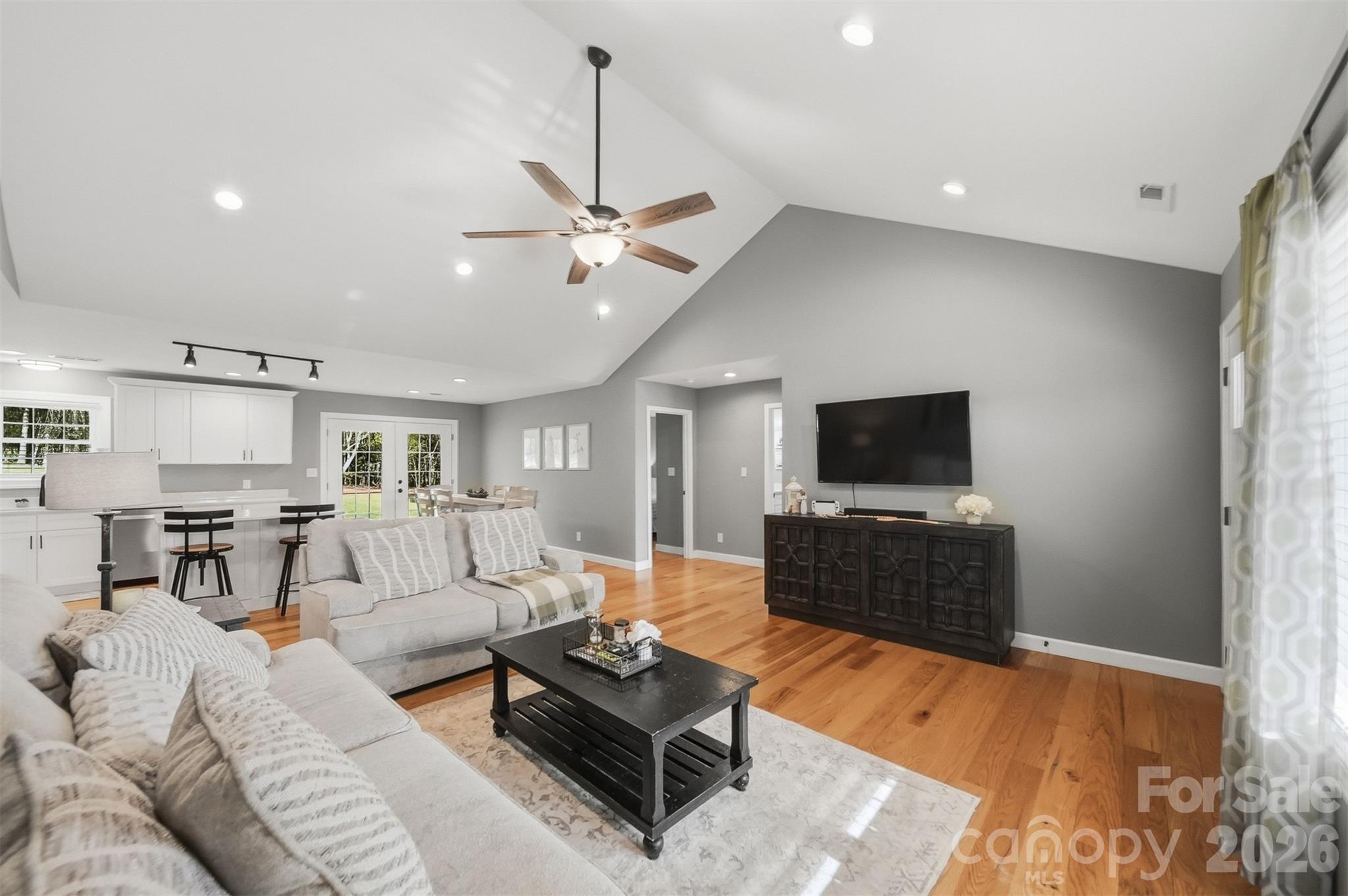 490 Dudley Shoals Road Granite Falls, NC 28630 - Photo 3 of 38 a living room with furniture and a flat screen tv