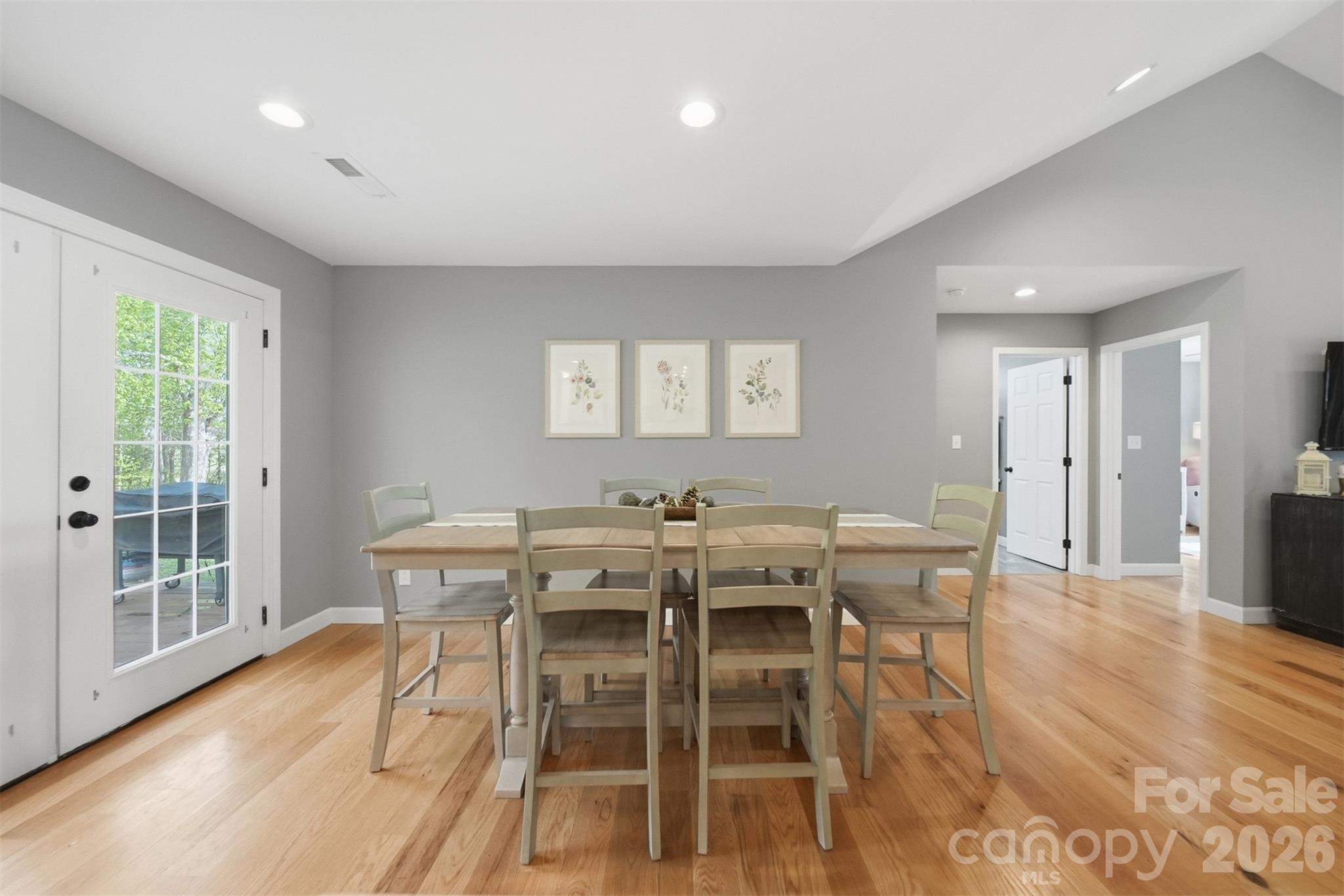 490 Dudley Shoals Road Granite Falls, NC 28630 - Photo 7 of 38 a view of a dining room with furniture and wooden floor