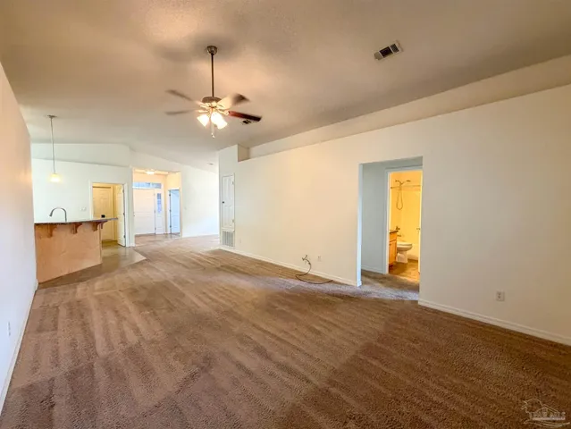 a view of an empty room and window