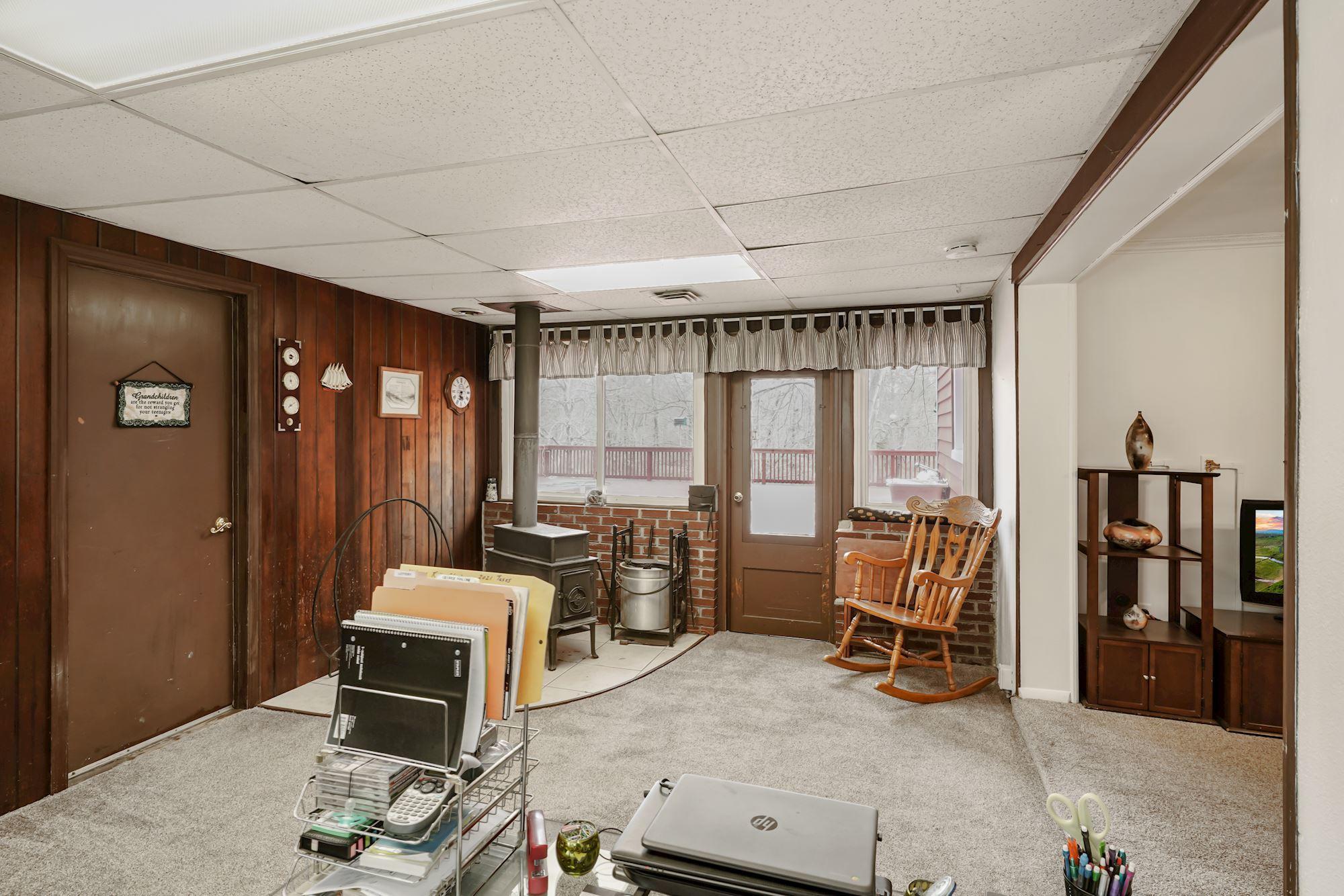 128 Hickory Road Jackson, NJ 08527 - Photo 13 of 25 a bedroom with furniture and large windows