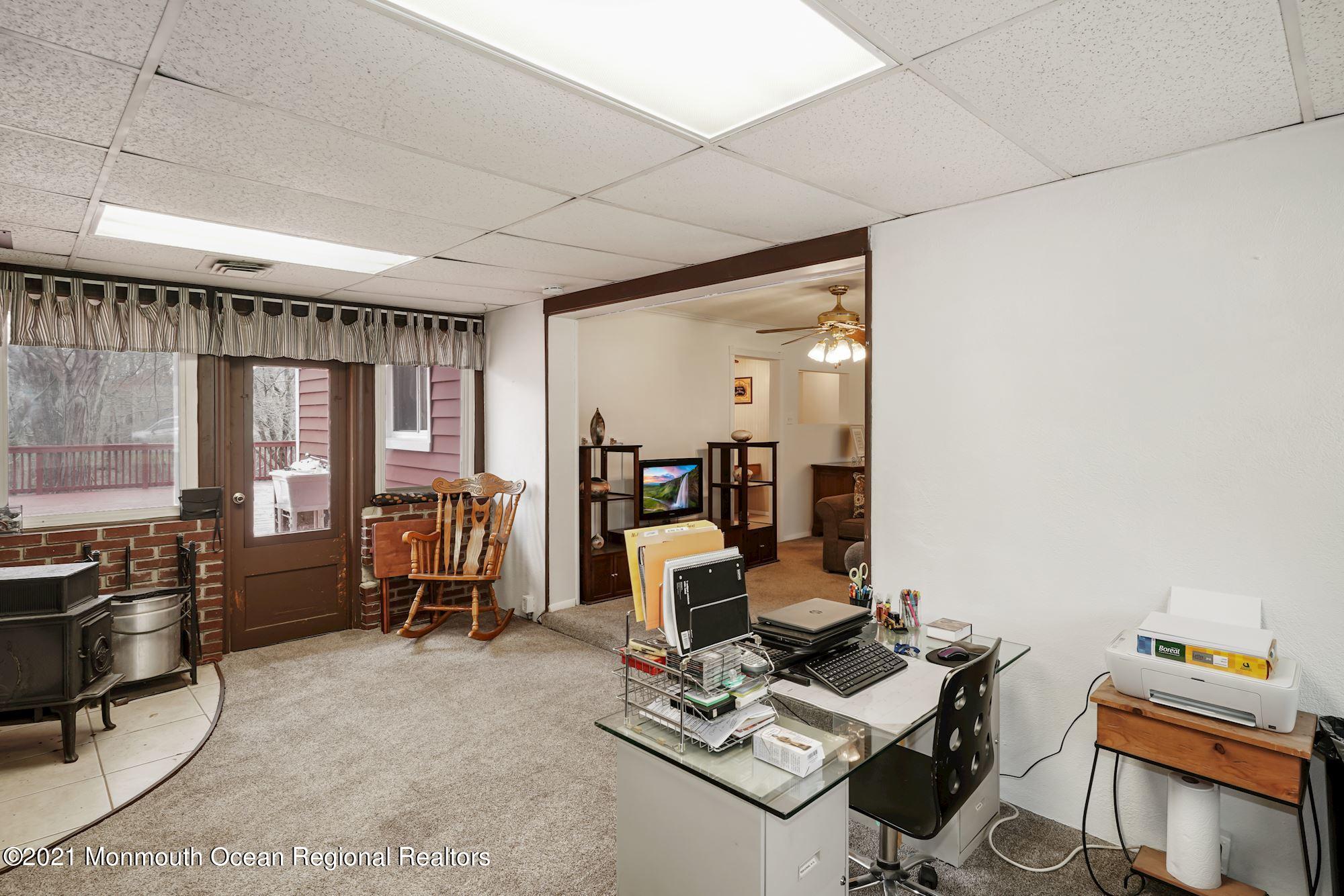 128 Hickory Road Jackson, NJ 08527 - Photo 14 of 25 a work room with furniture
