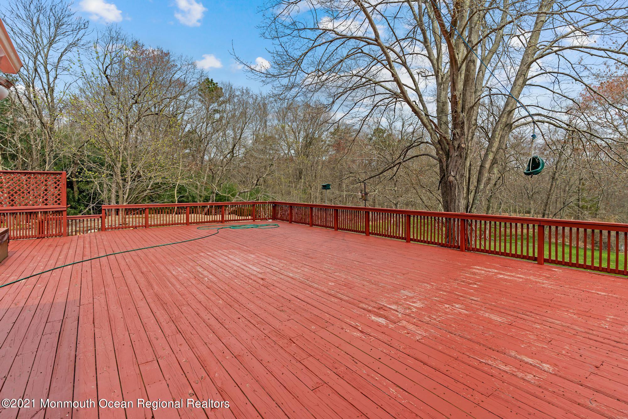 128 Hickory Road Jackson, NJ 08527 - Photo 7 of 25 a view of a tennis court