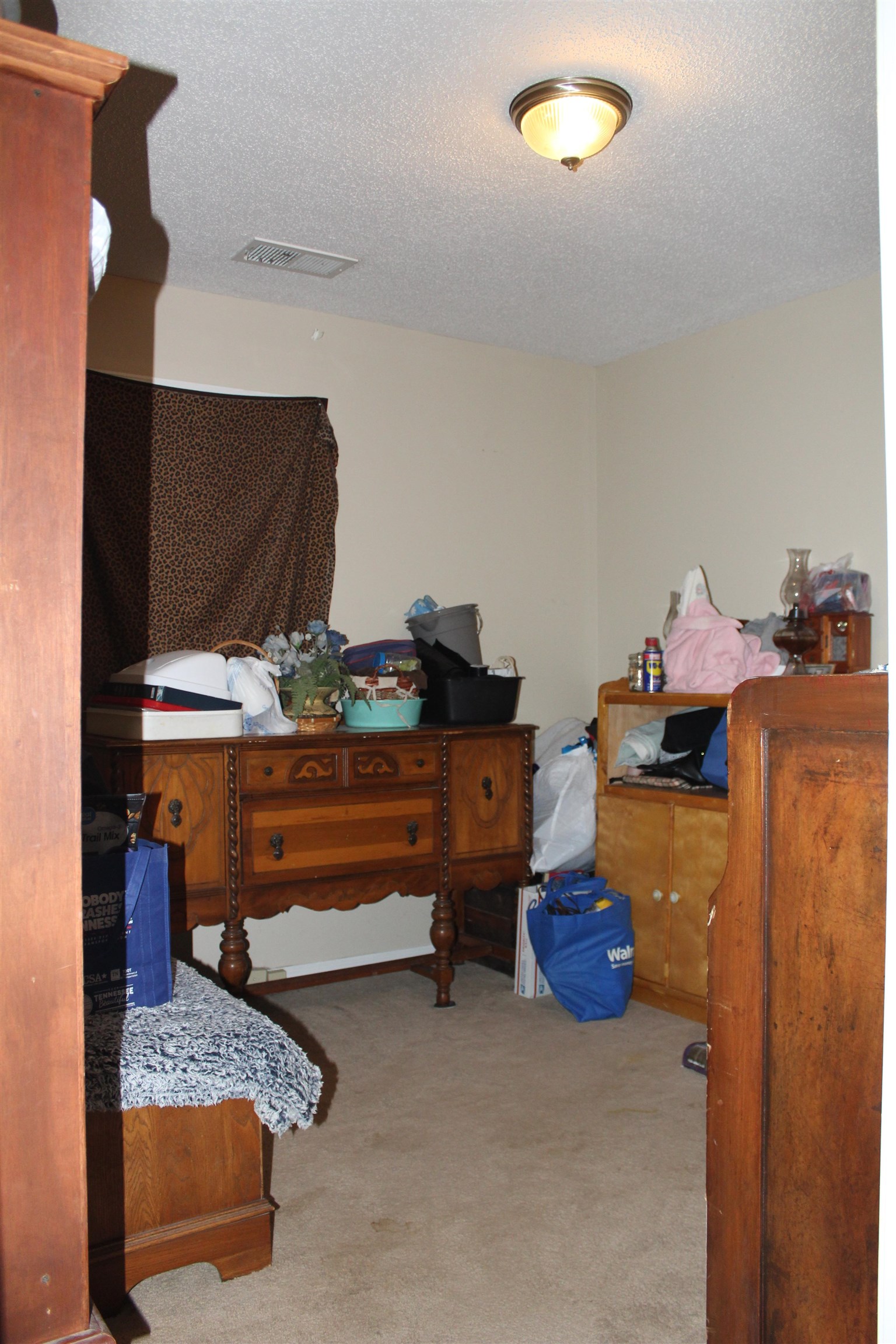 1039 Hyde Road Ripley, TN 38063 - Photo 15 of 21 a room with furniture and a flat screen tv