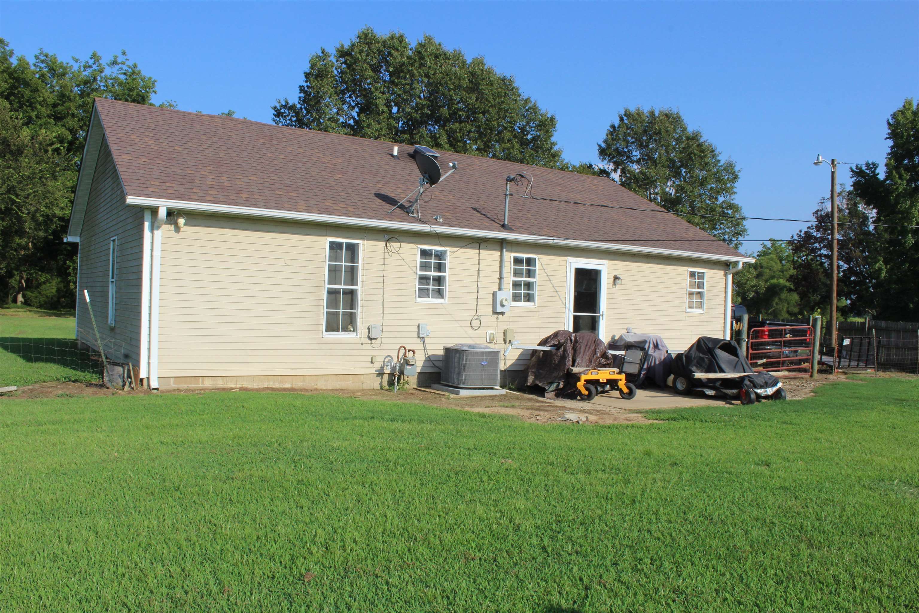 1039 Hyde Road Ripley, TN 38063 - Photo 16 of 21 a front view of house with yard and green space