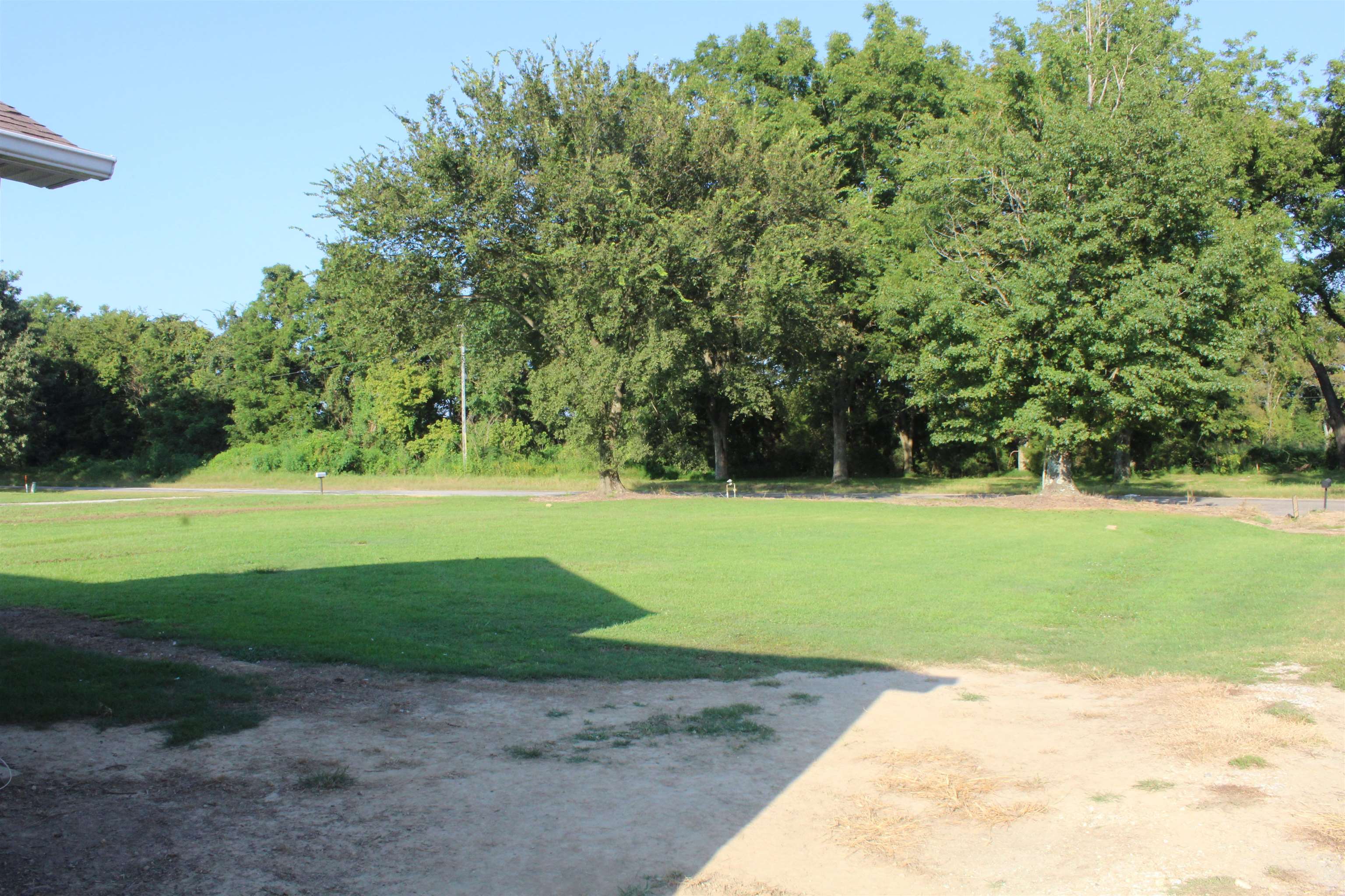 1039 Hyde Road Ripley, TN 38063 - Photo 17 of 21 a view of a garden with basketball court
