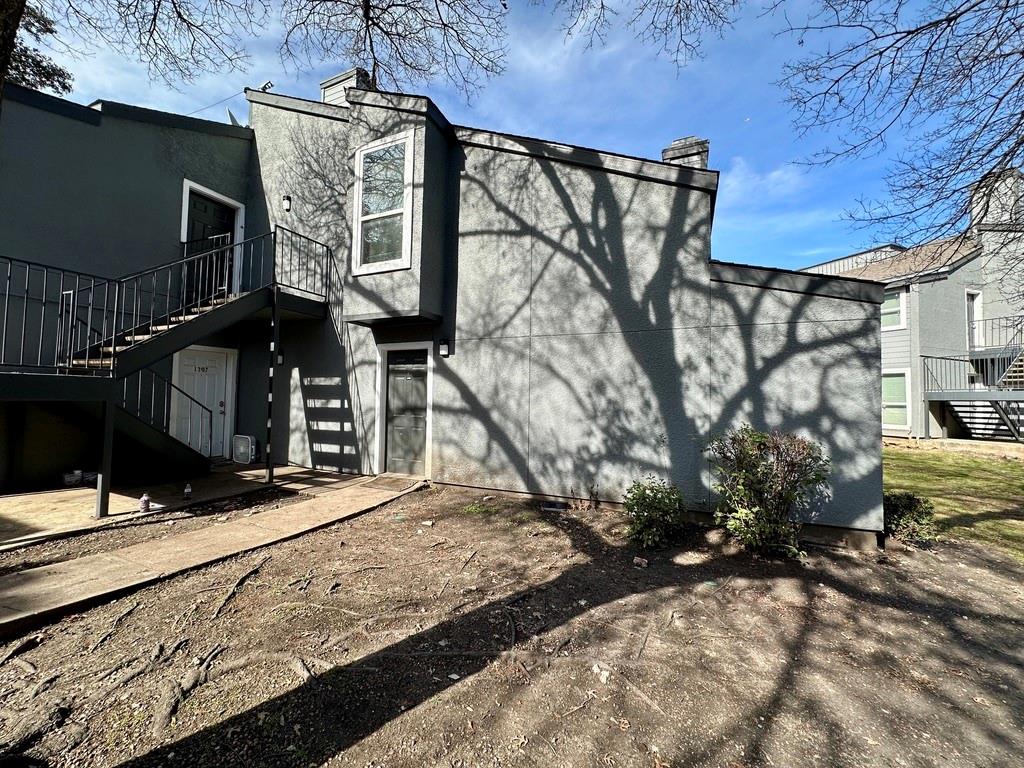9696 Walnut Street, Unit 1308 Dallas, TX 75243 - Photo 1 of 1 a view of a house with a snow on the road