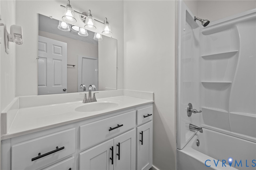 114 Huntington Road Colonial Heights, VA 23834 - Photo 17 of 40 a bathroom with a sink a toilet and shower