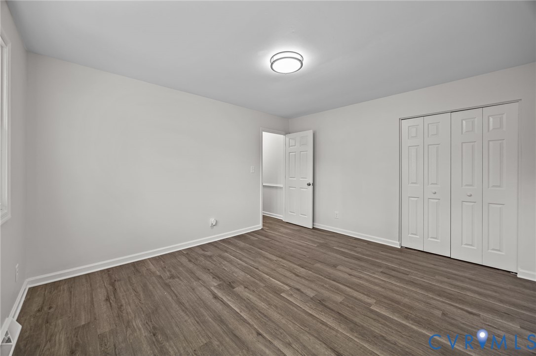 114 Huntington Road Colonial Heights, VA 23834 - Photo 24 of 40 a view of an empty room with wooden floor