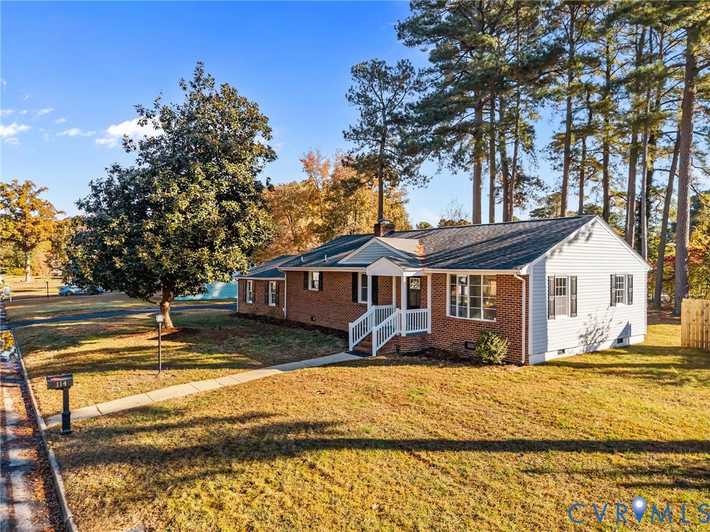 114 Huntington Road Colonial Heights, VA 23834 - Photo 32 of 40 a front view of a house with a yard
