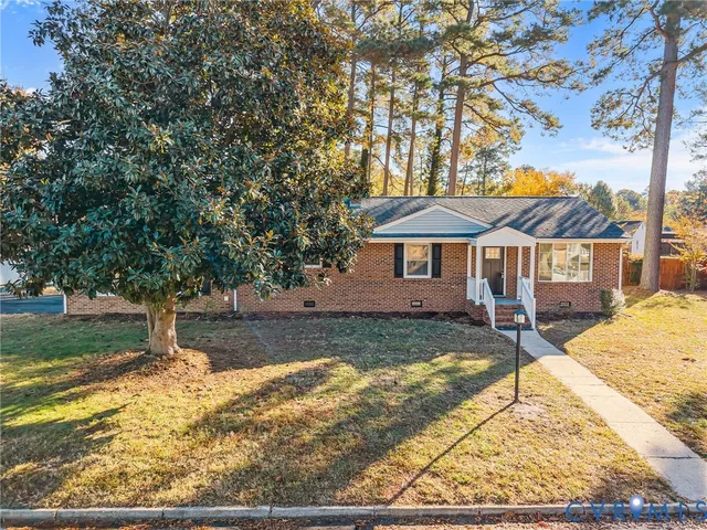 a house with trees in the background