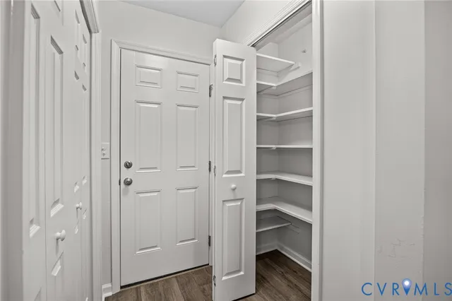 a view of an empty walk in closet